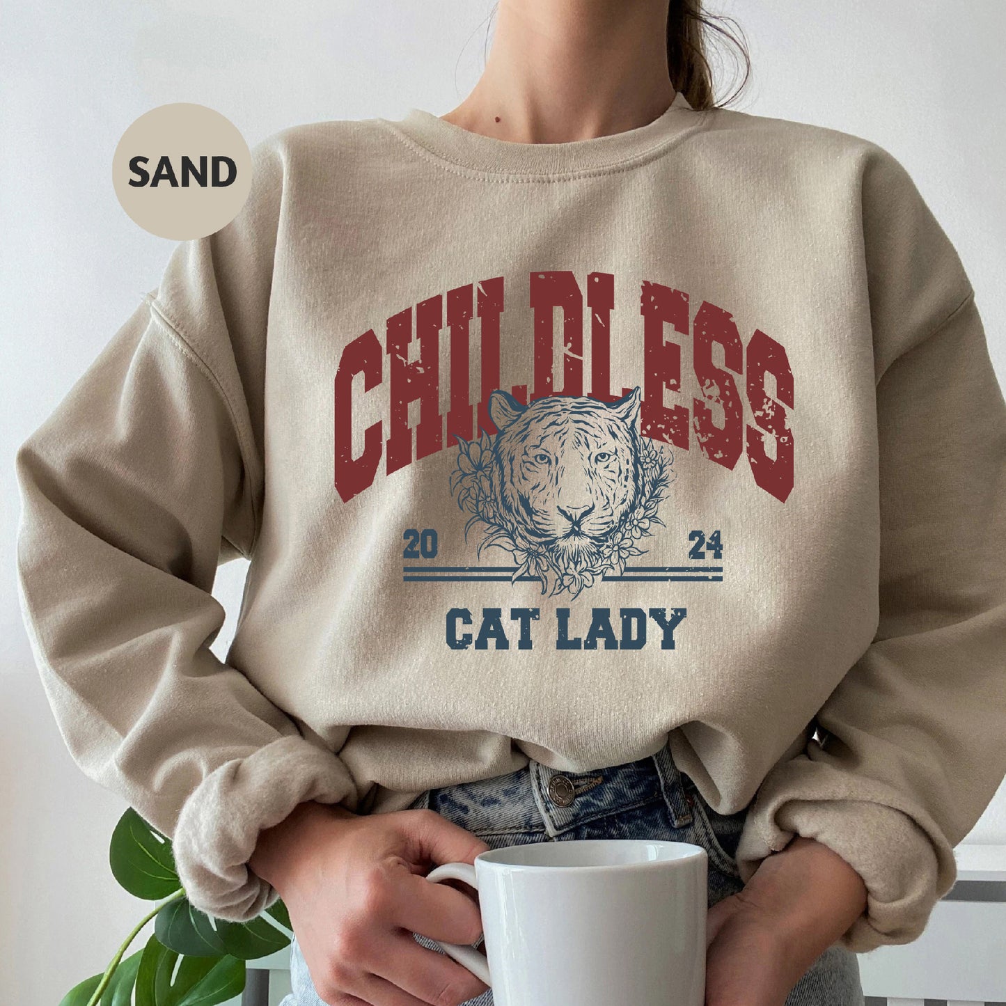 a woman holding a coffee mug in her hands