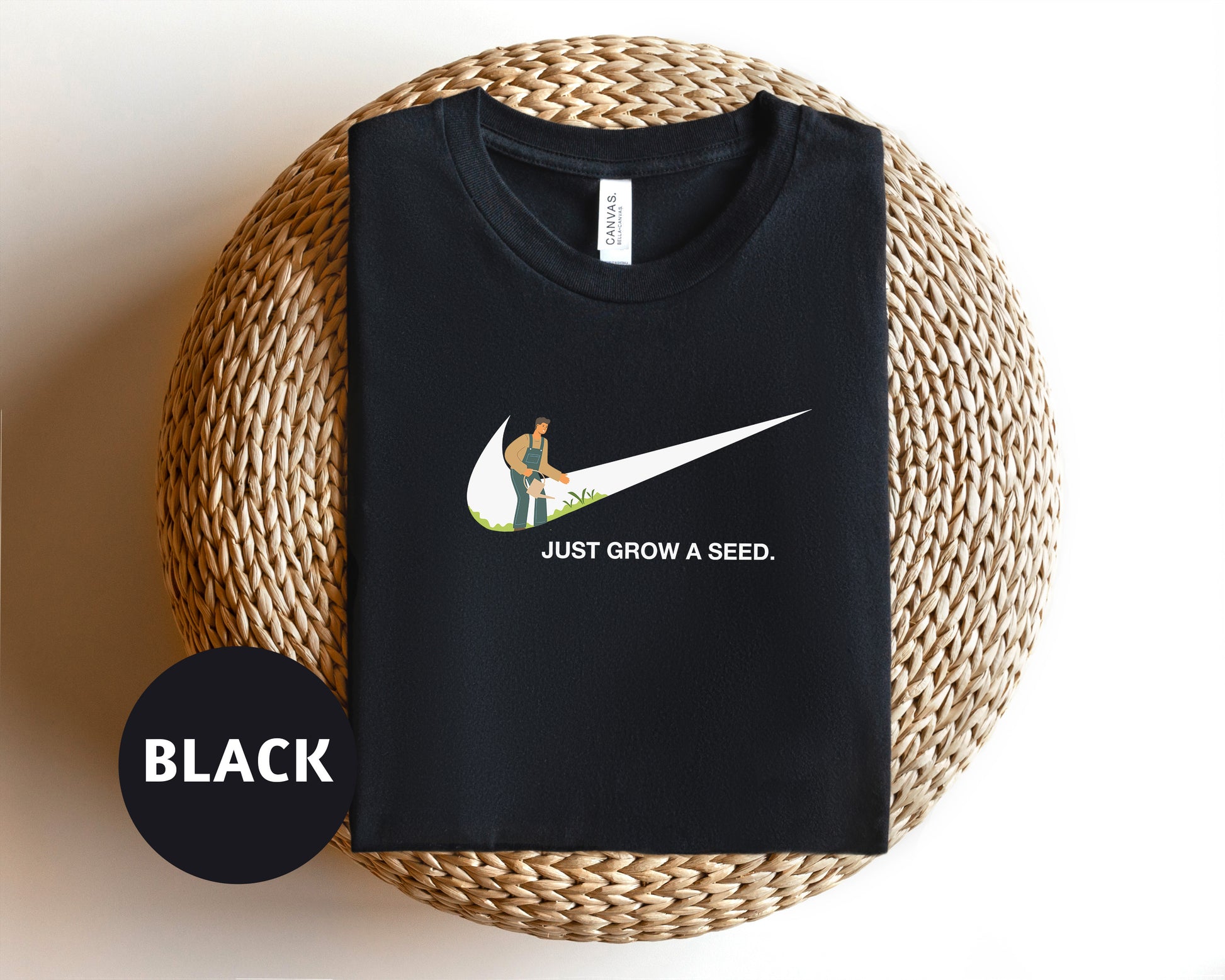 a black t - shirt with a white nike logo on it