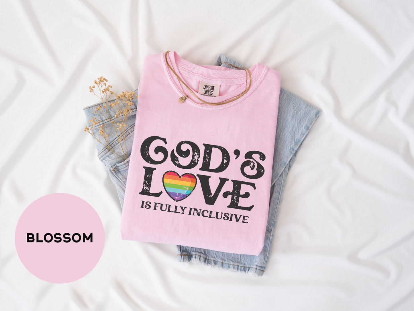 a pink shirt that says god's love is fully inclusive