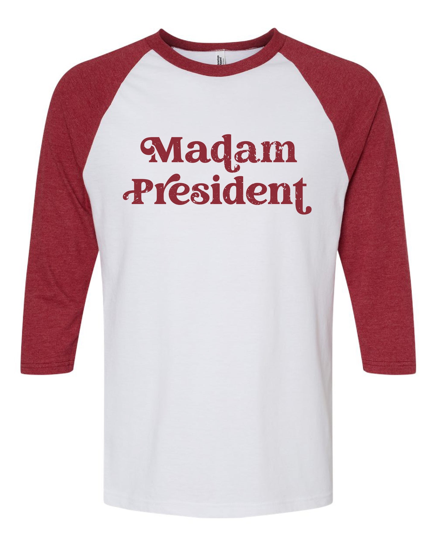 a red and white shirt that says madam president