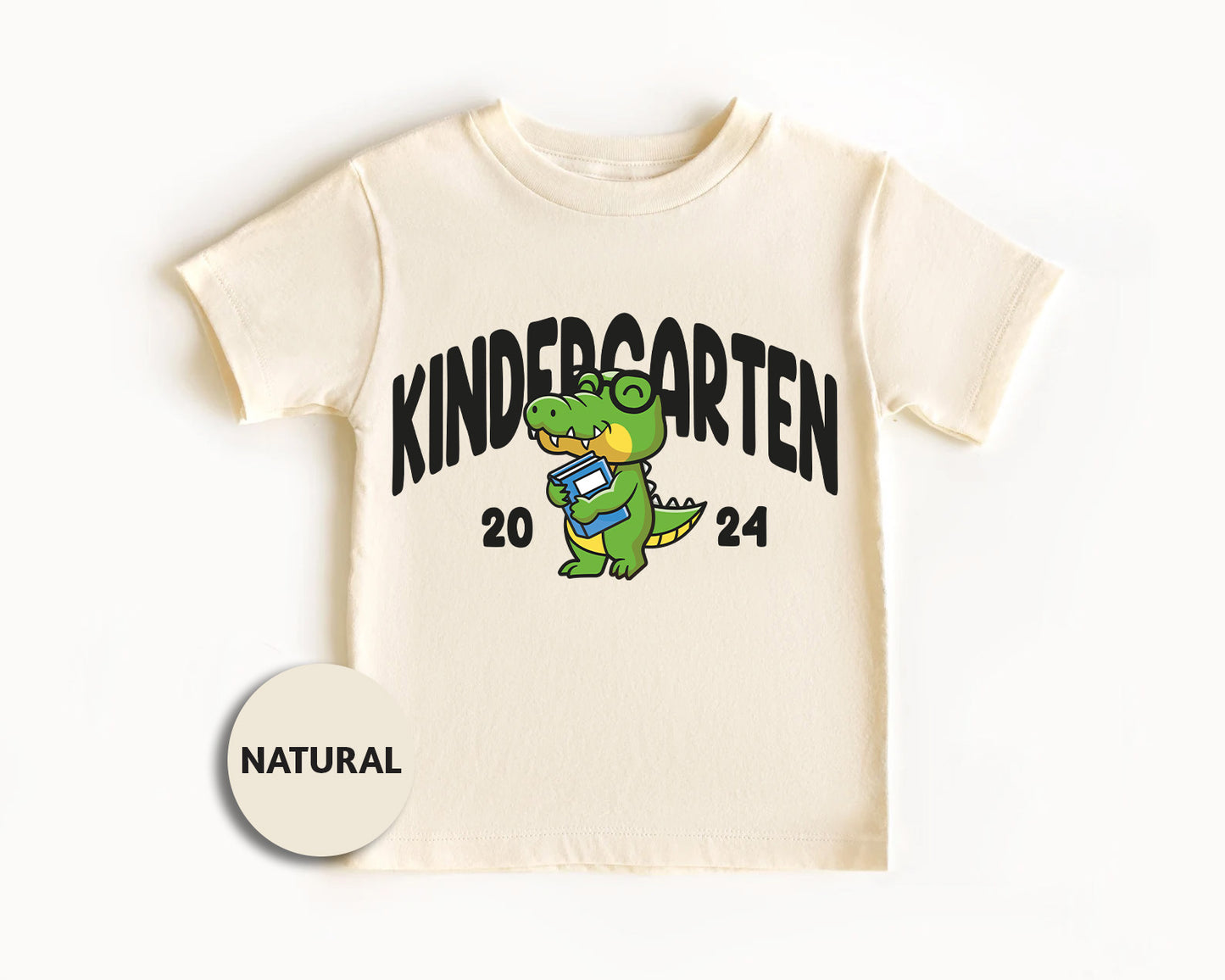 a t - shirt with a picture of a dinosaur on it