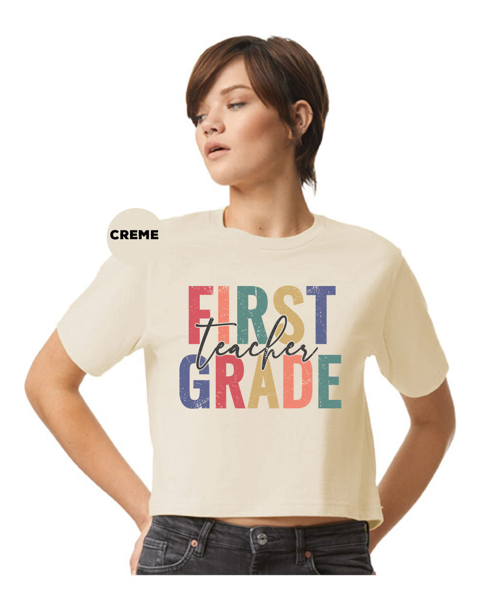 a woman wearing a t - shirt that says first grade