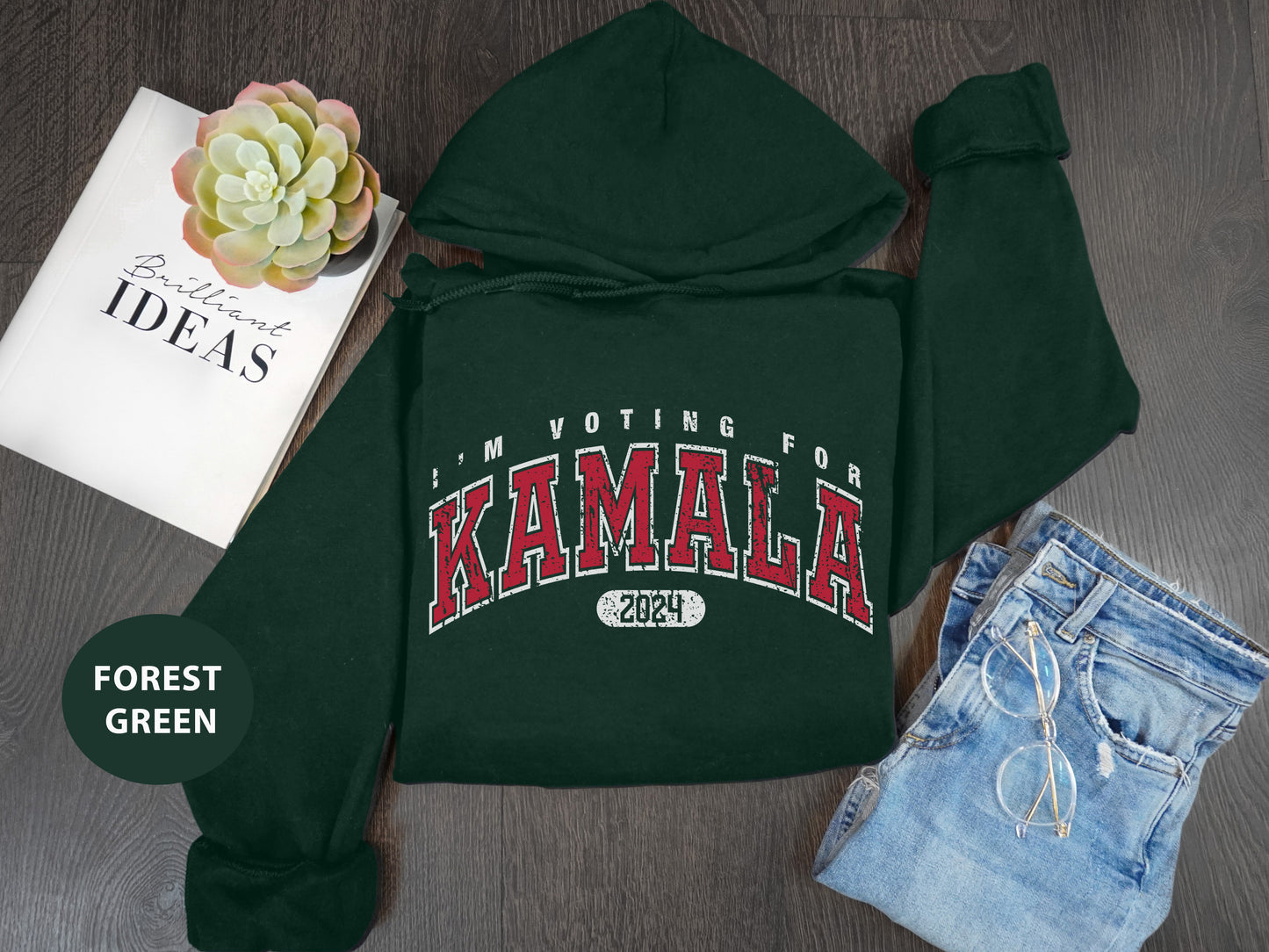 a green hoodie with the words i am voting for kaalaa on it
