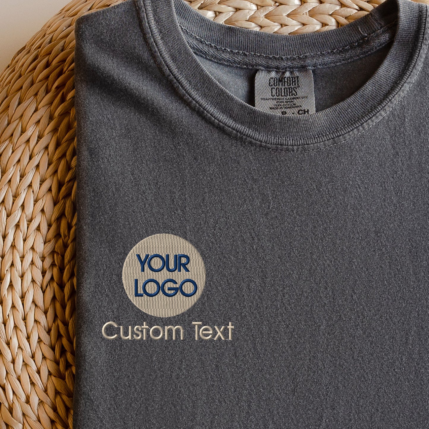 a gray t - shirt with a custom text on it