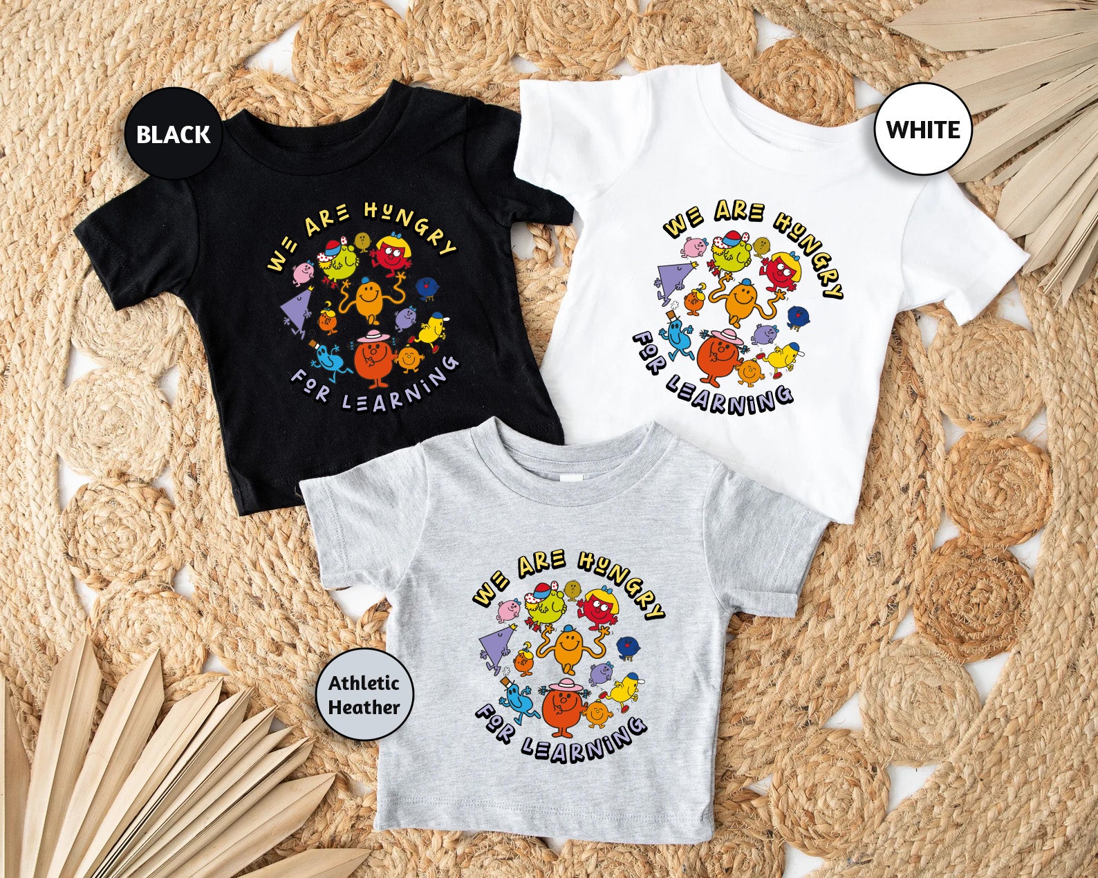 three t - shirts with different designs on them
