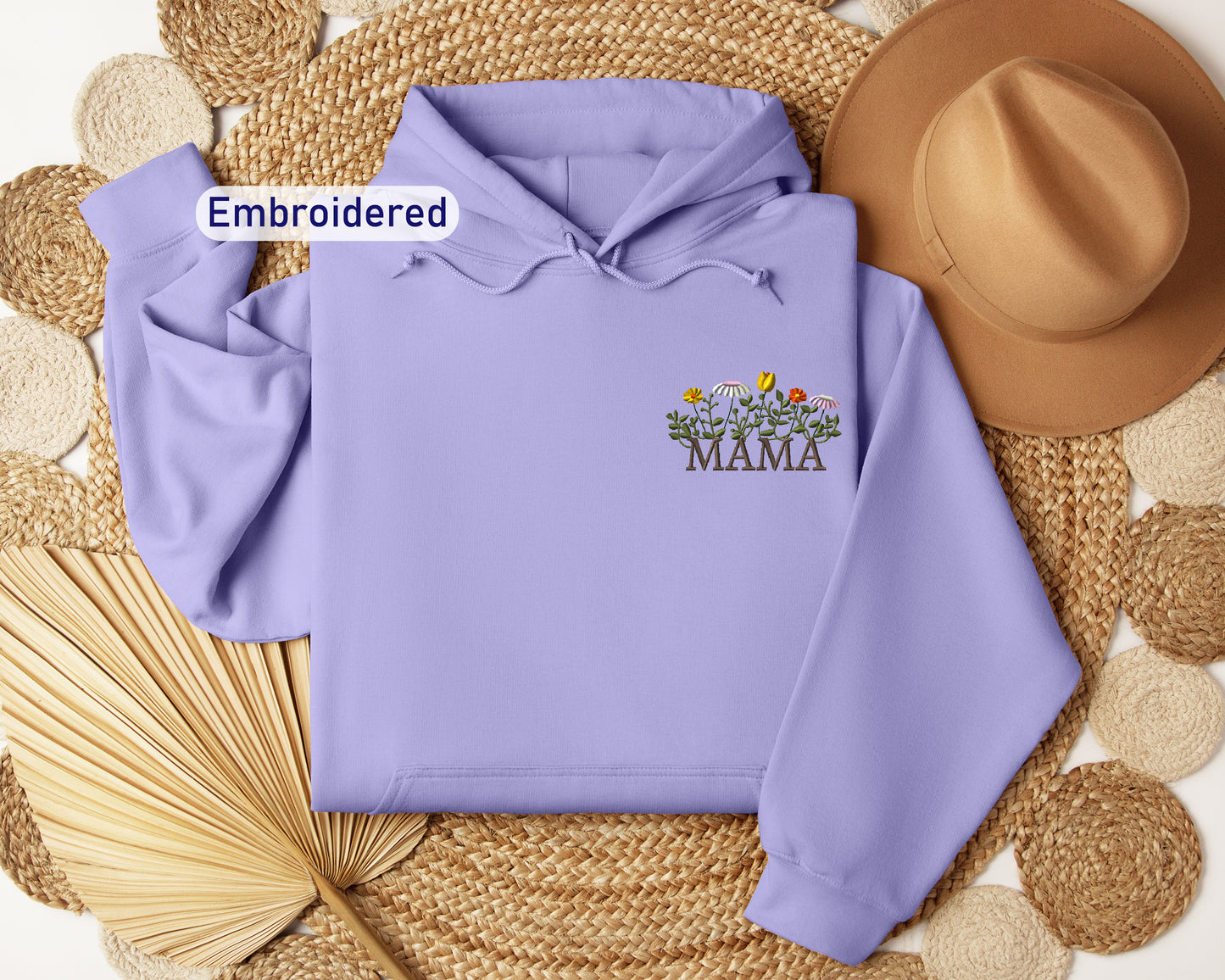 a purple hoodie with the words embroidered on it