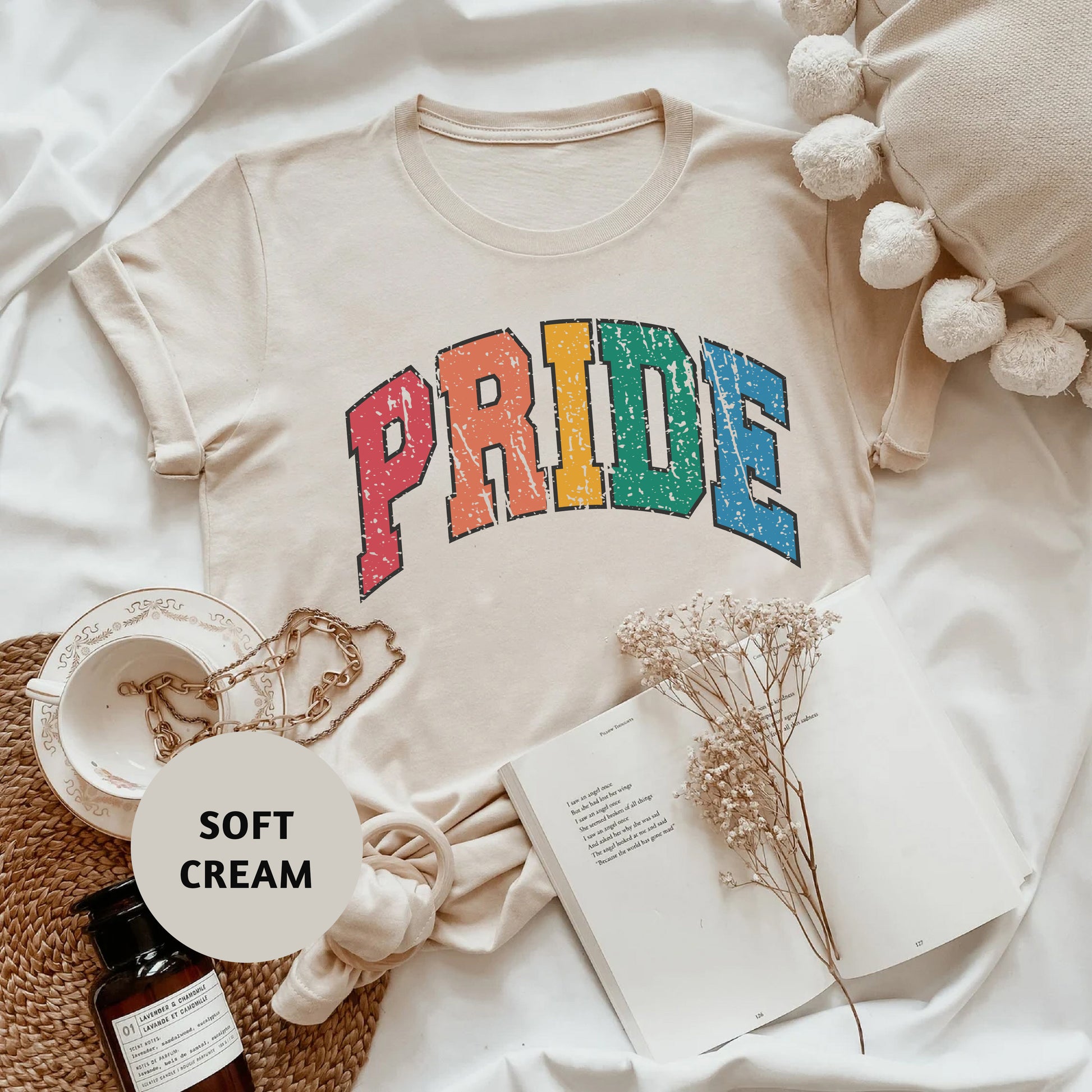 a white t - shirt with the word pride printed on it