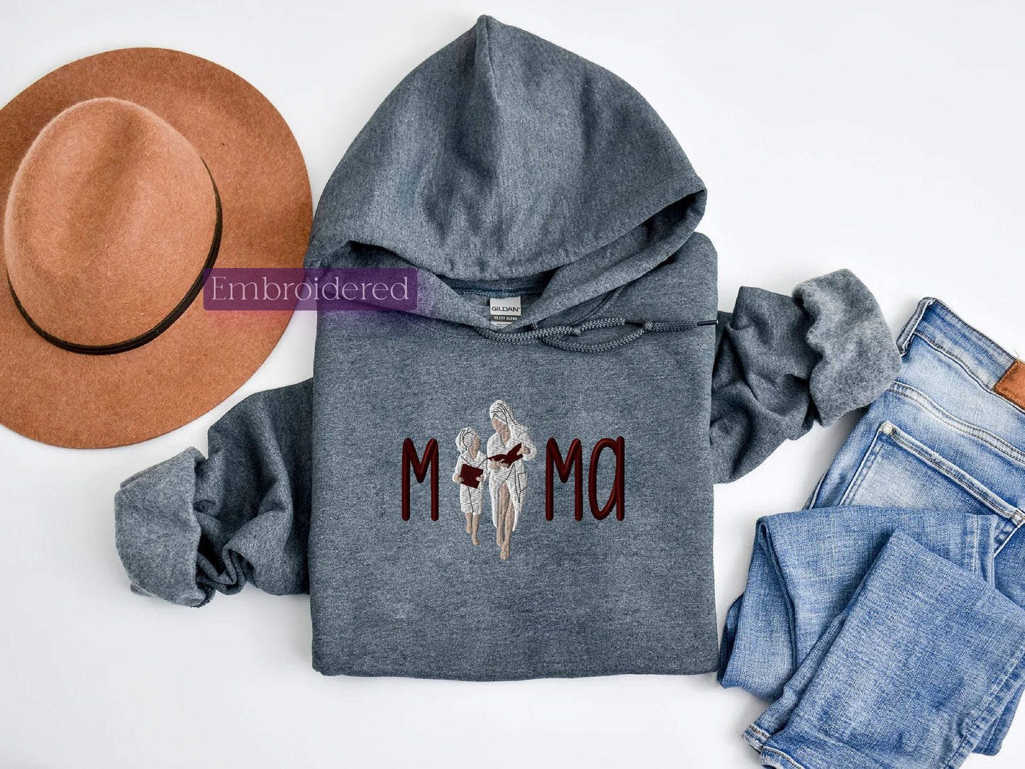 a gray hoodie with the word mom written on it
