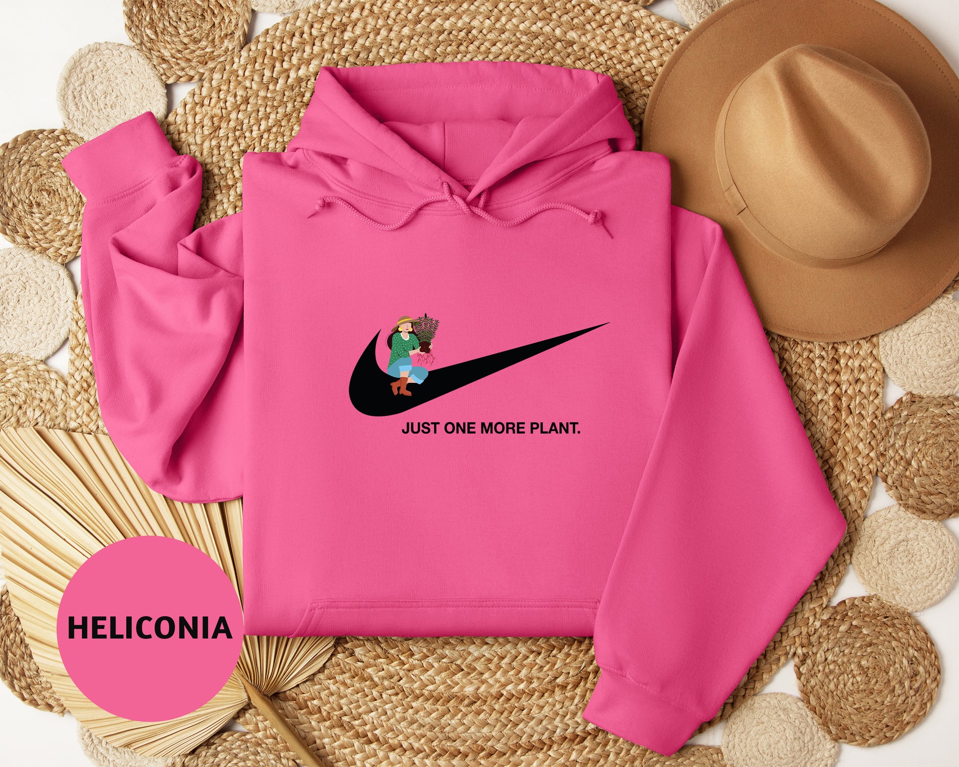 a pink hoodie with the words just one more plant on it