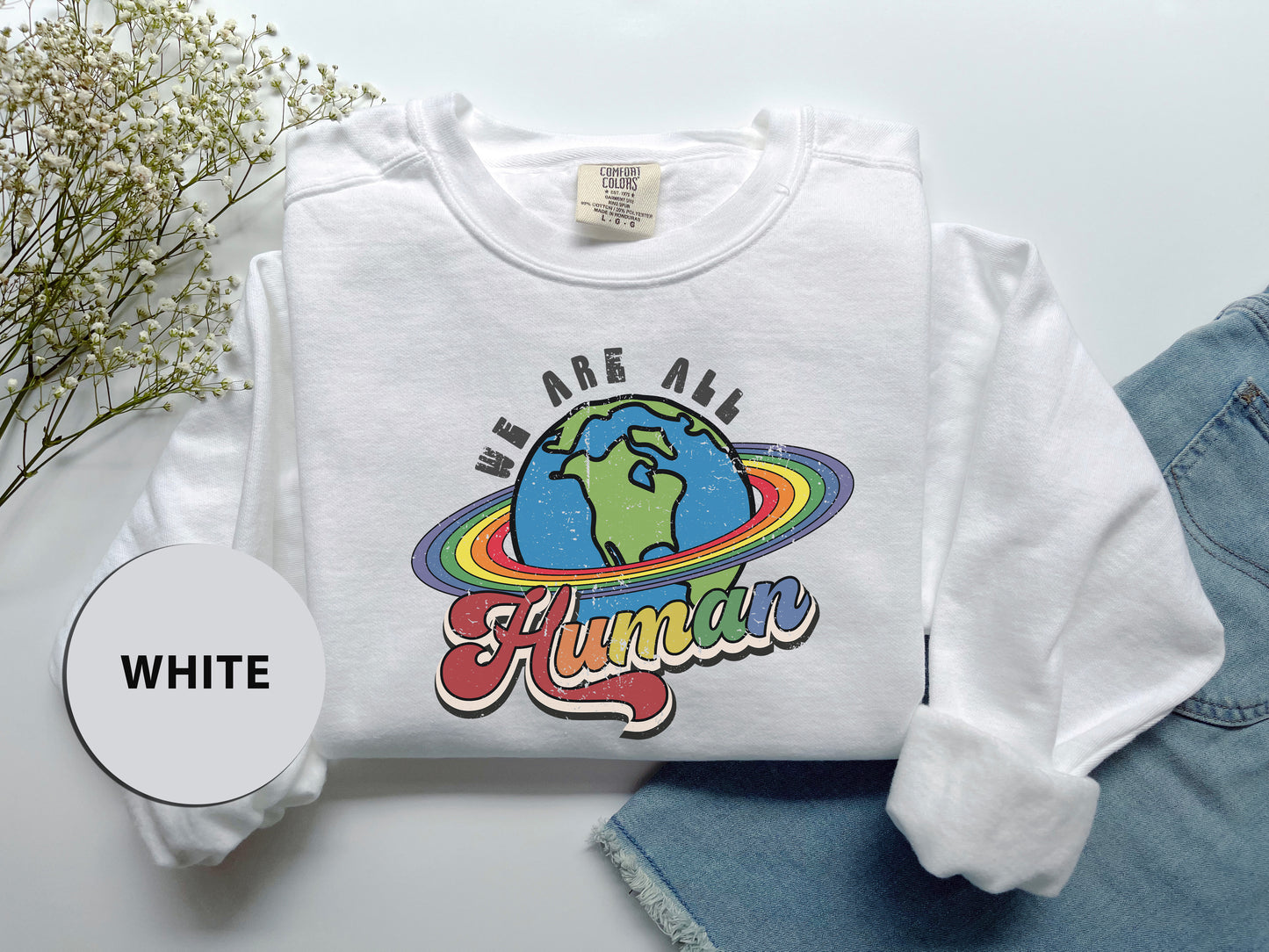 a white shirt with a picture of the earth on it