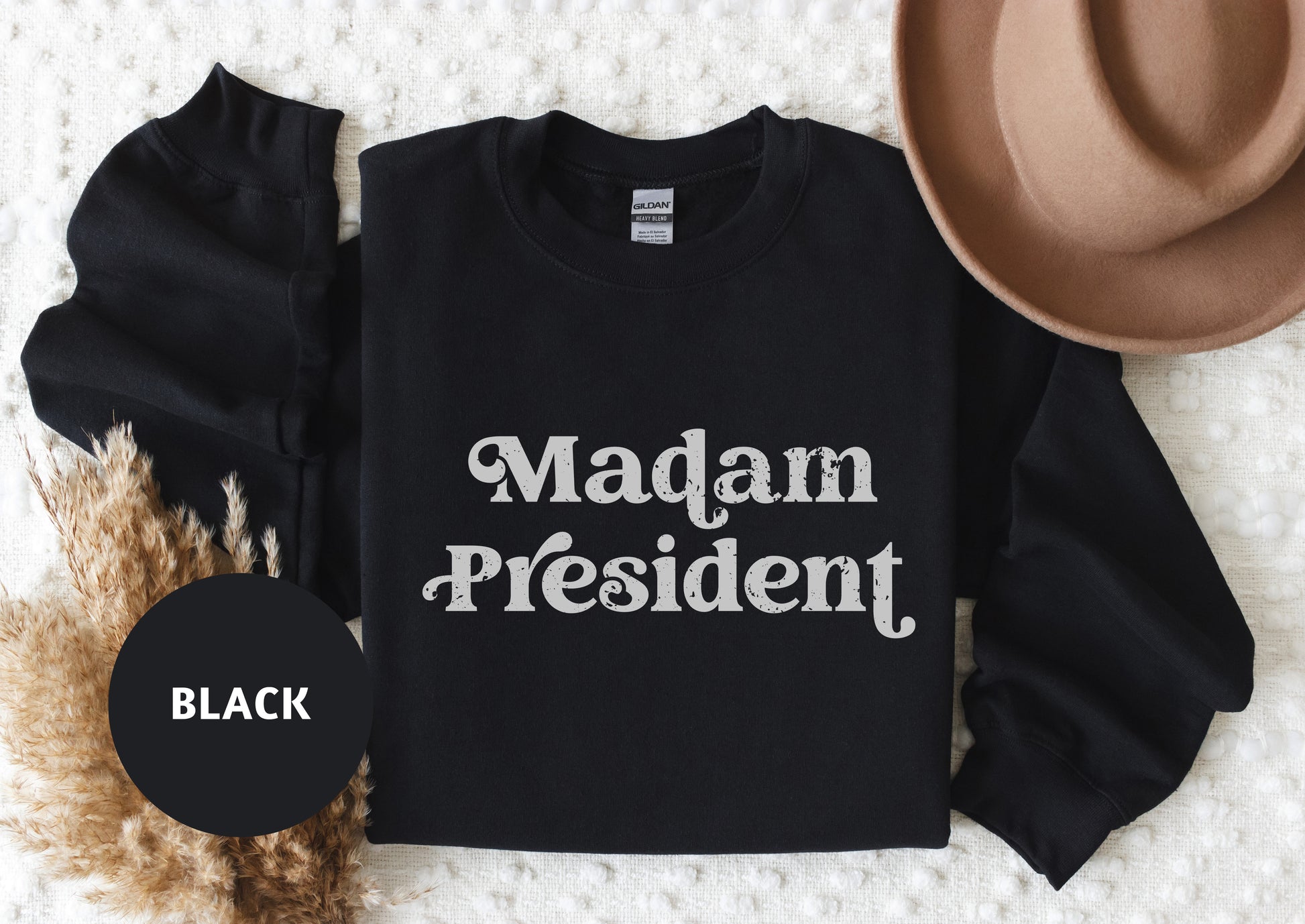 a black shirt with the words madam president printed on it