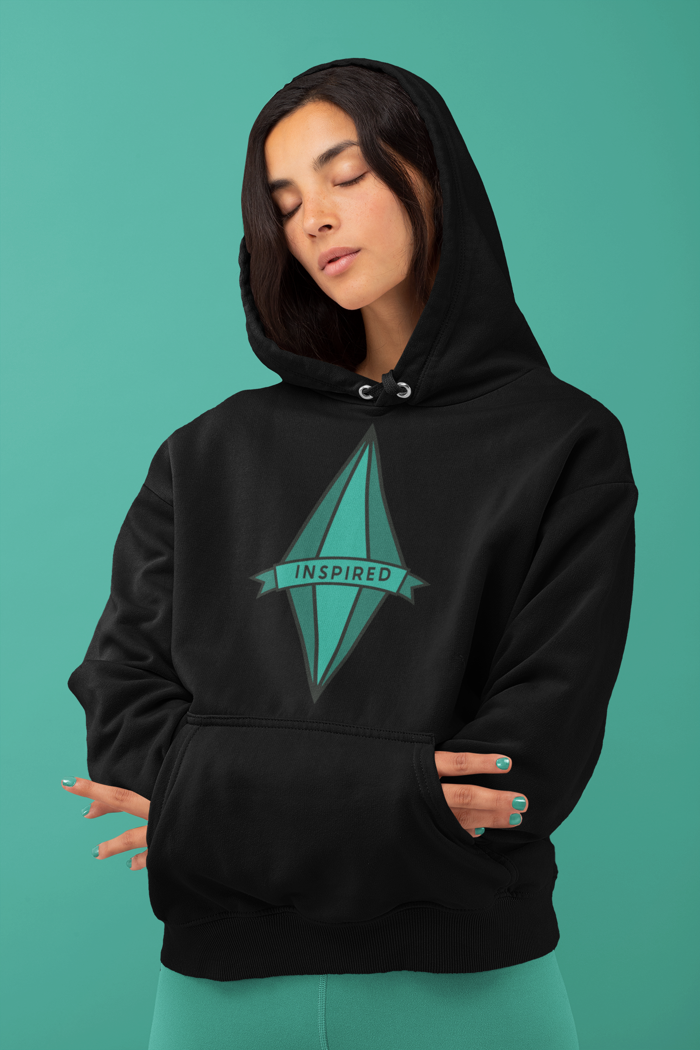a woman wearing a black hoodie with a green arrow on it