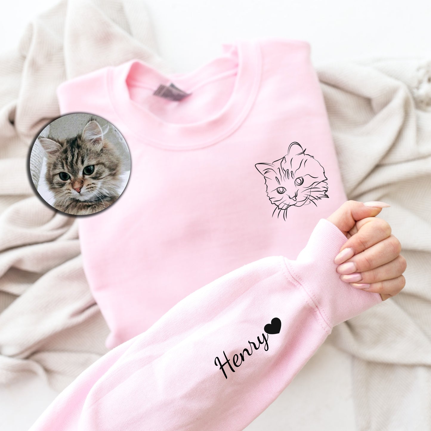 a person holding a mirror with a cat on it