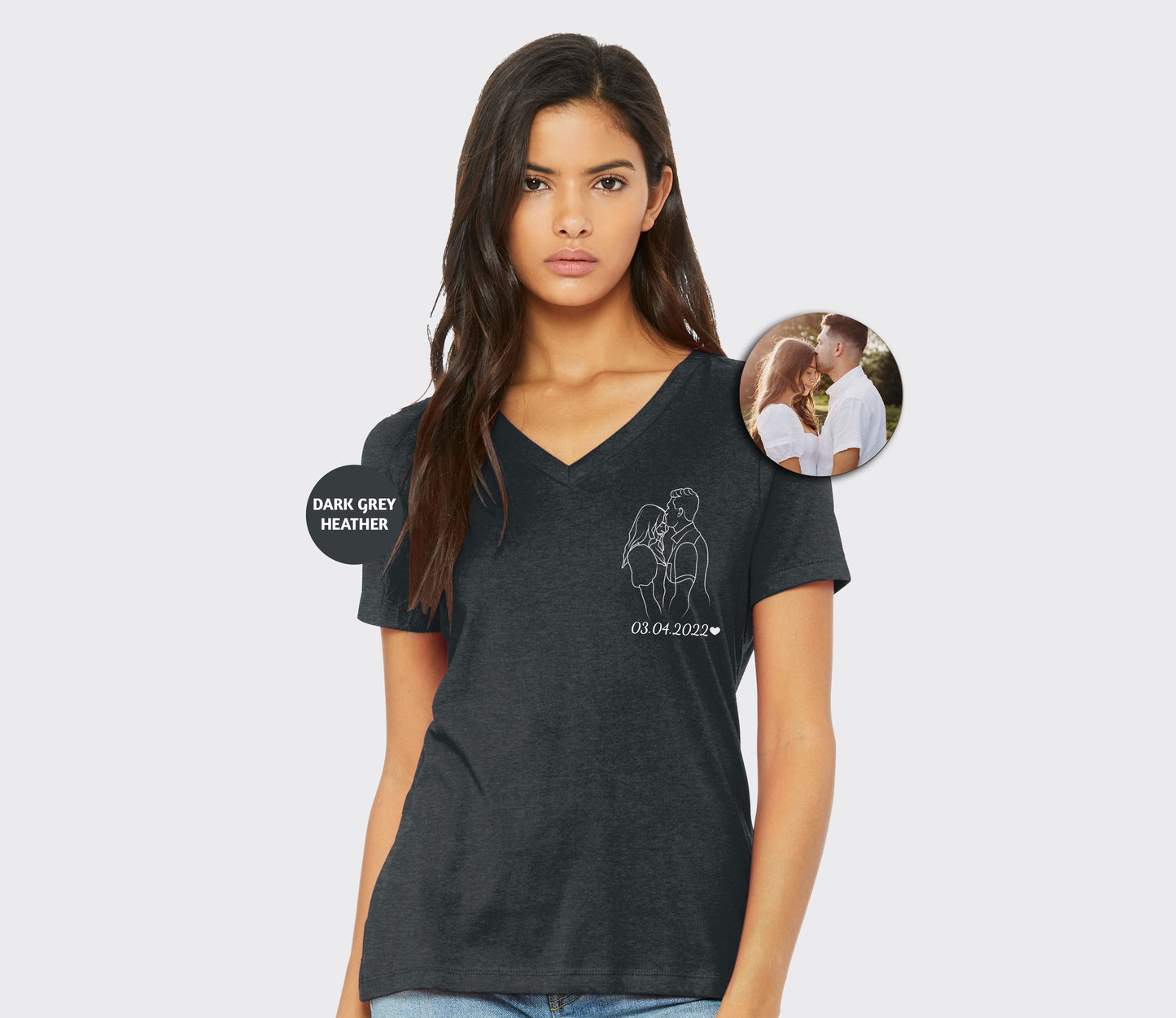 a woman wearing a t - shirt with a picture of a man and a woman
