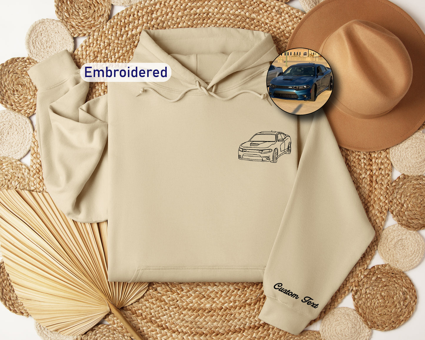 a picture of a hoodie with a picture of a car on it