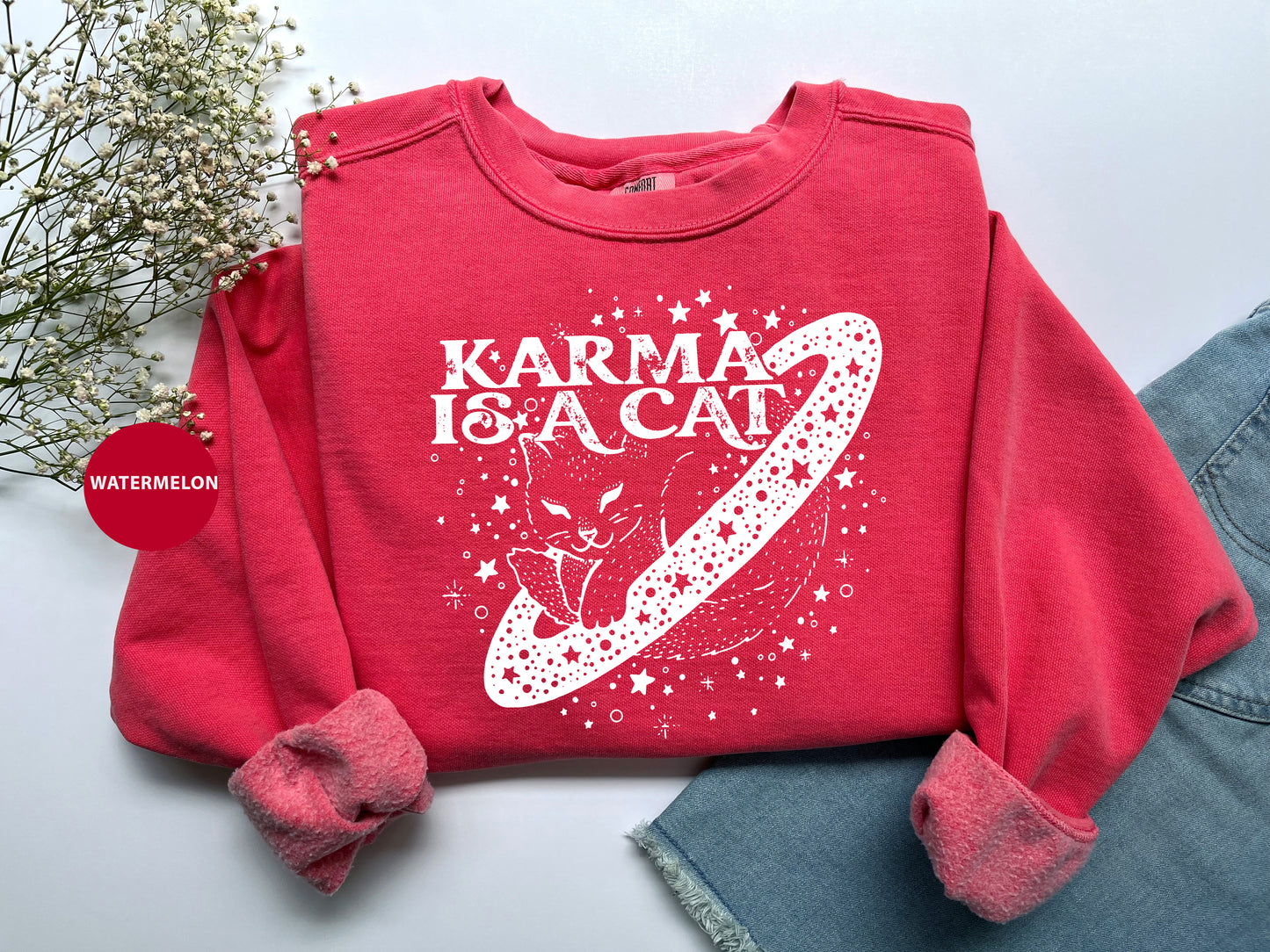 a red sweatshirt with a white graphic on it