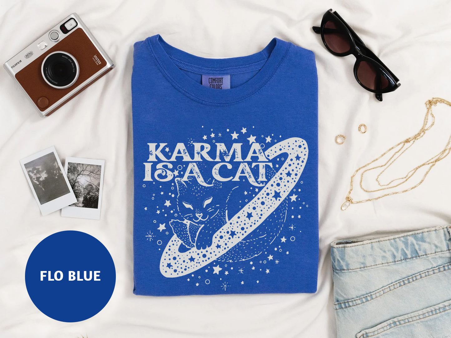 a t - shirt with the words karma is a cat on it