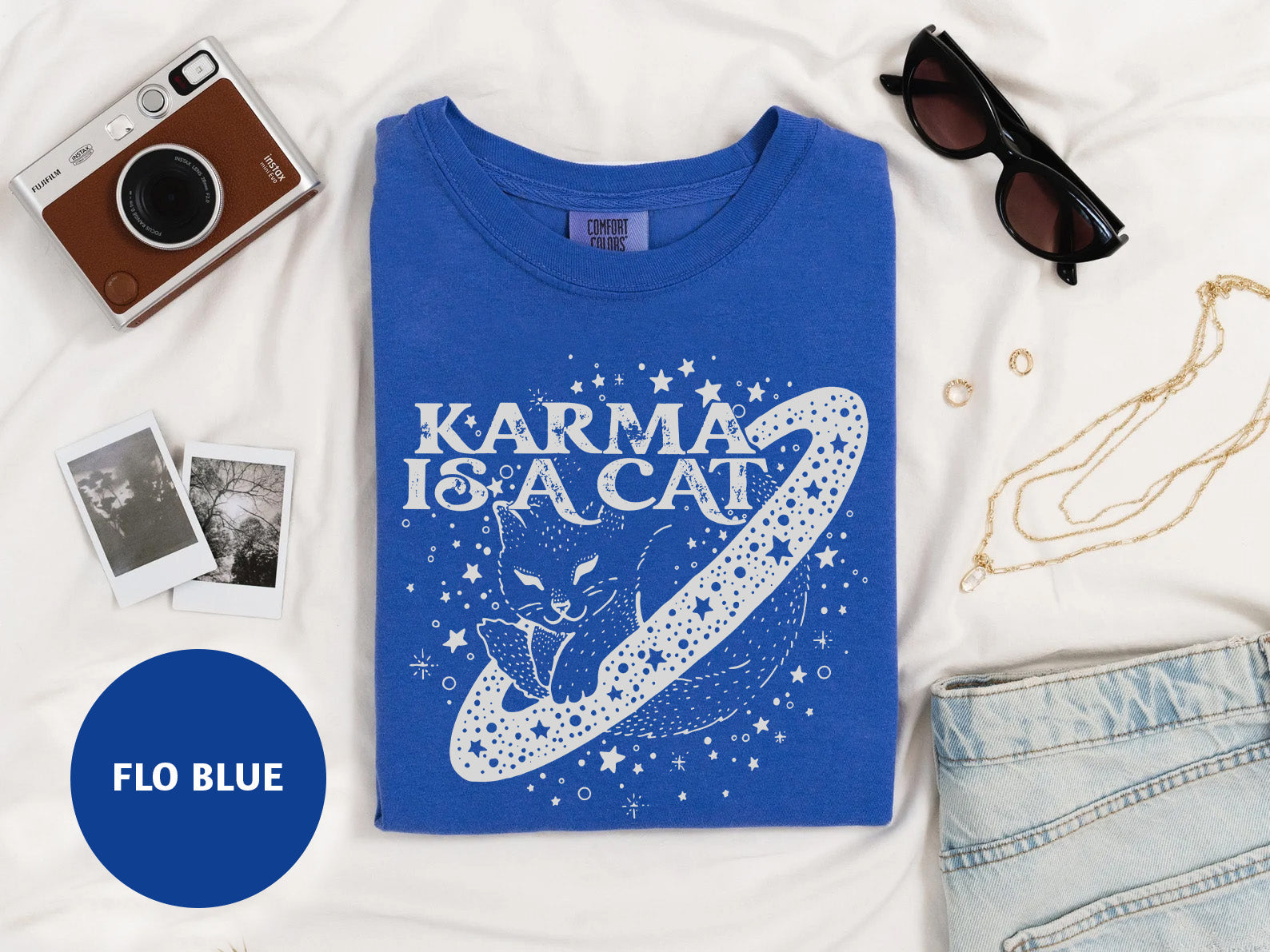 a t - shirt with the words karma is a cat on it