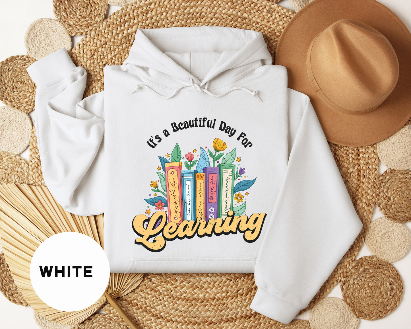 a white hoodie with the words learning printed on it