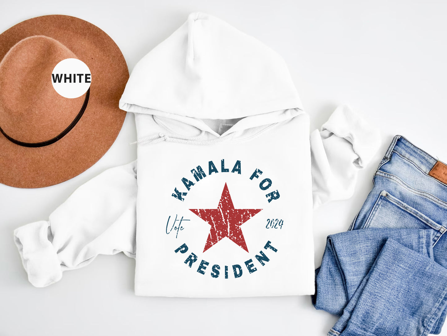 a white hoodie with a red star on it