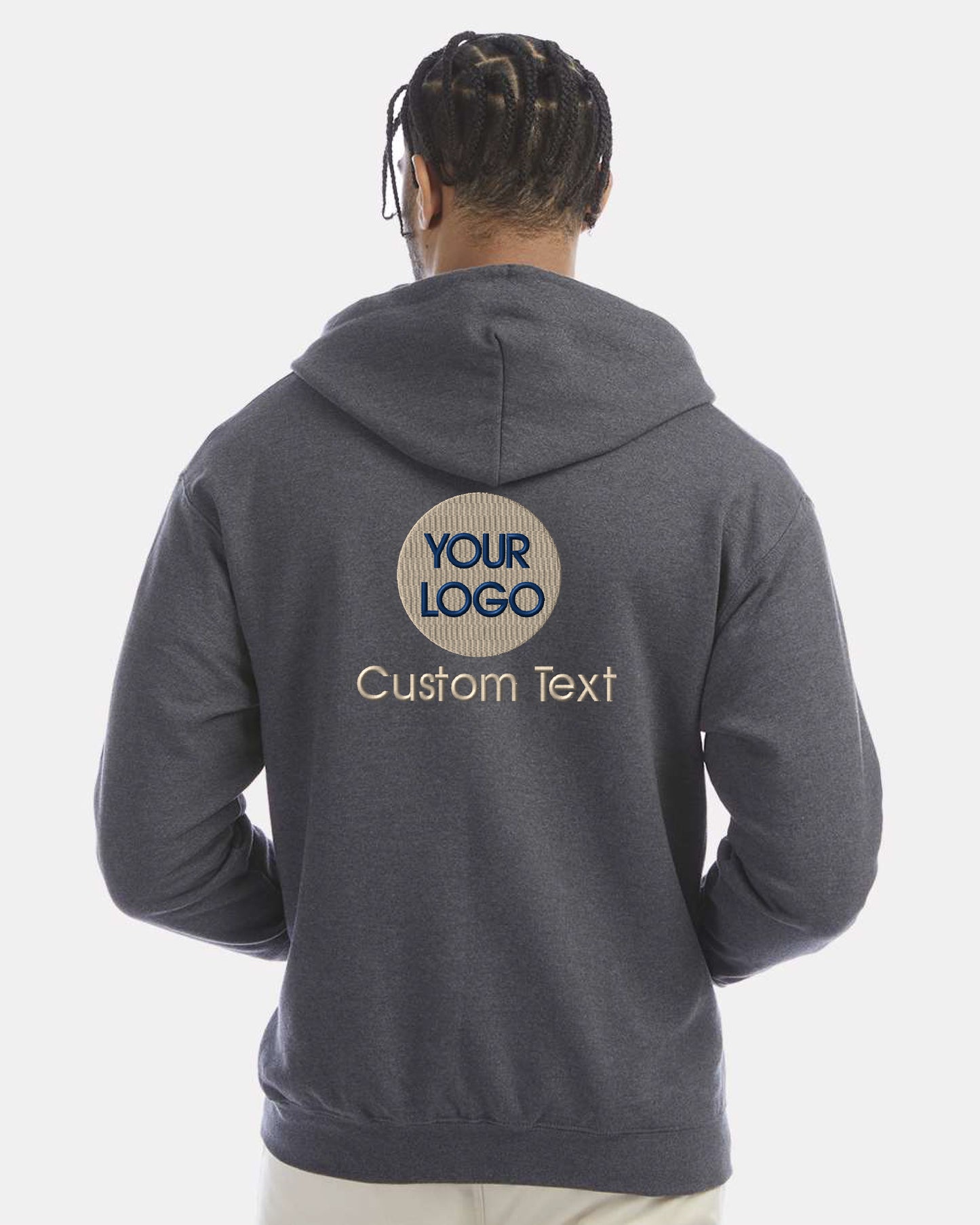 a man with dreadlocks wearing a gray hoodie