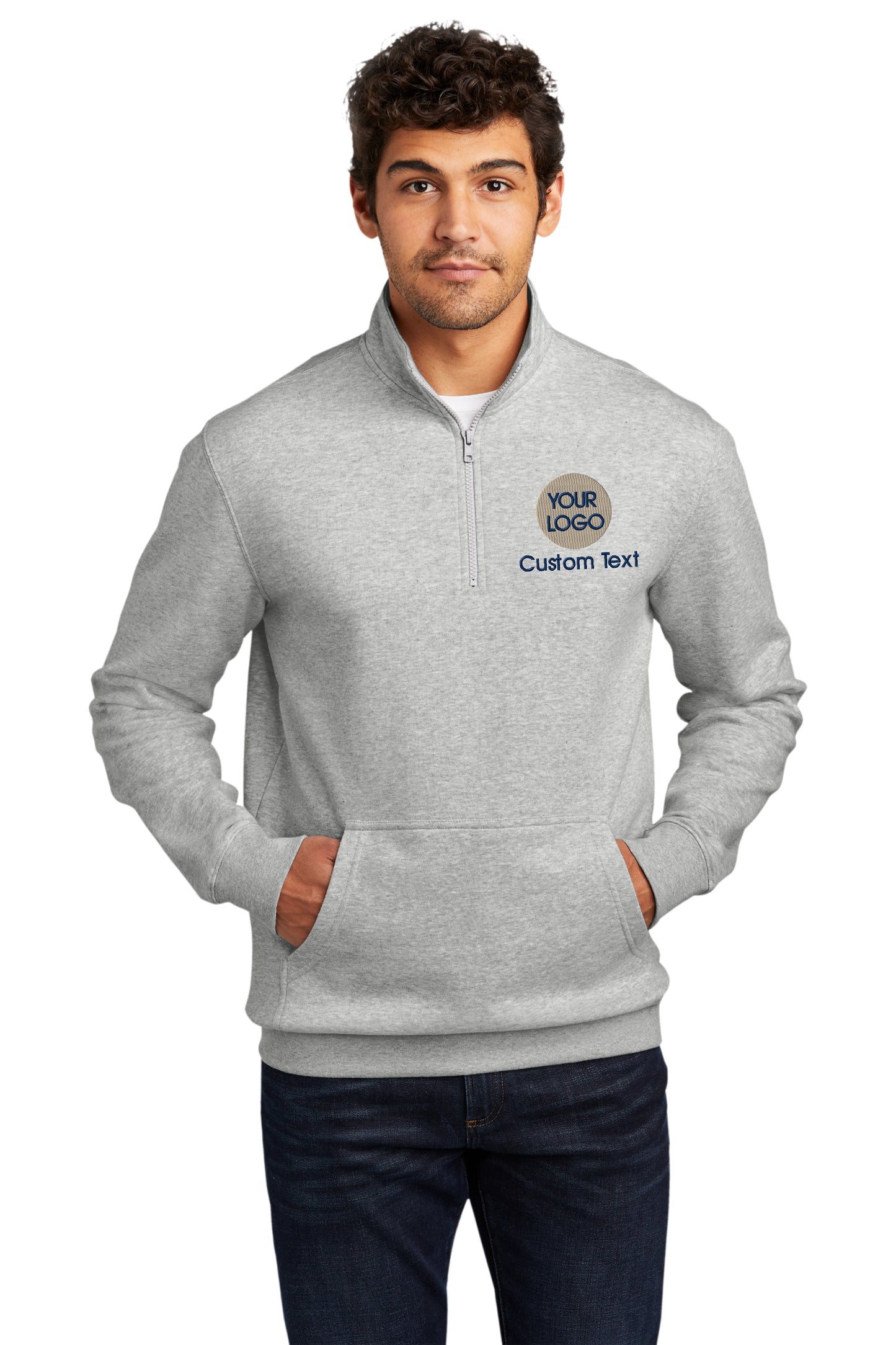 a man wearing a grey sweatshirt with a blue and white logo on it