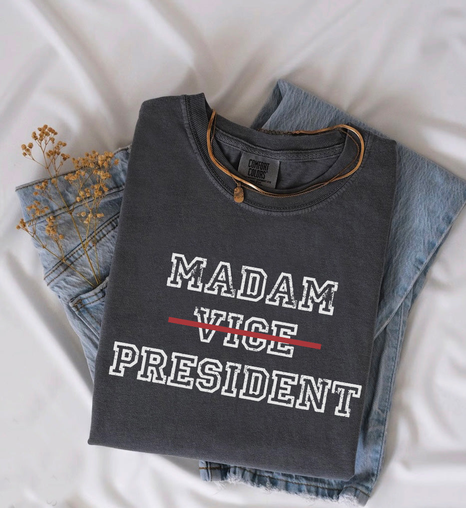 a t - shirt that says madam vice president on it