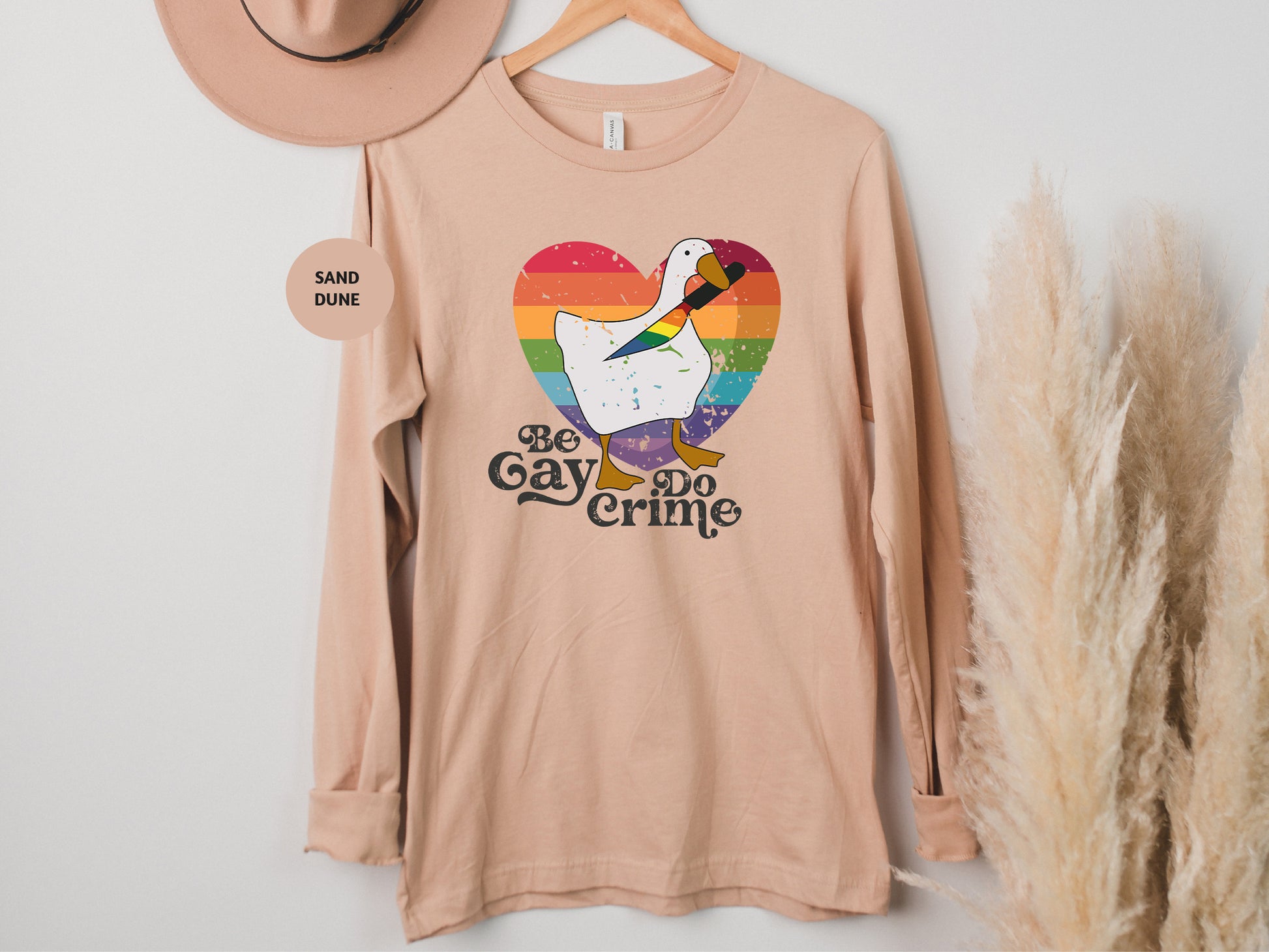 a t - shirt with a picture of a goose on it