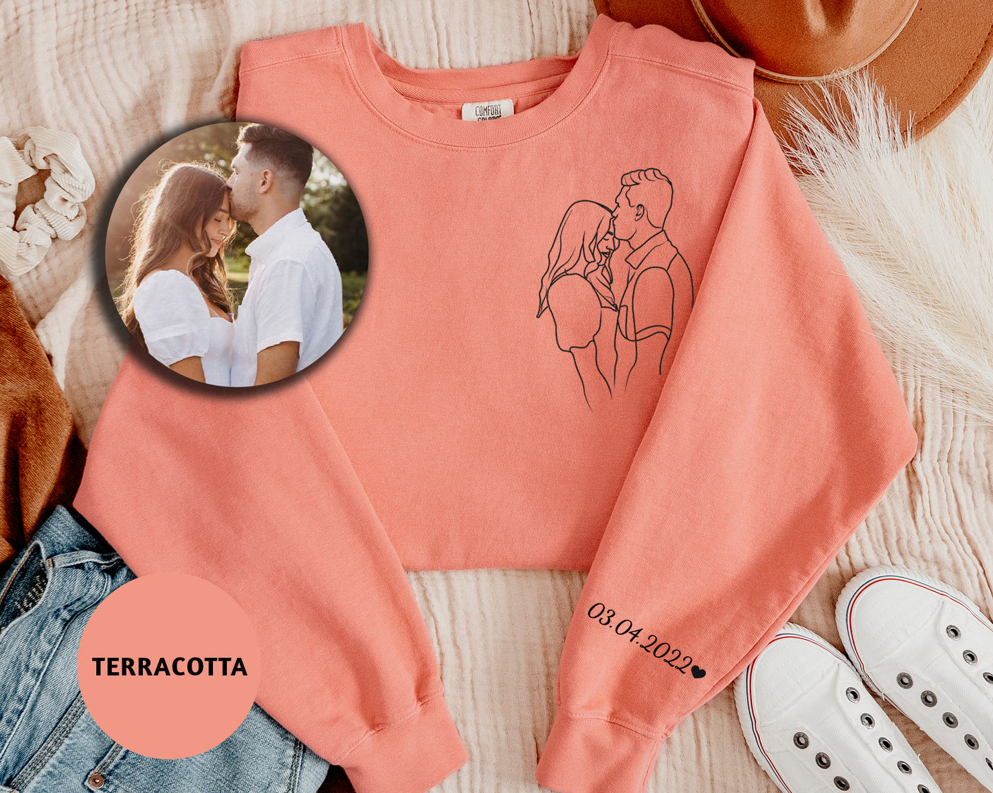 a sweater with a picture of a couple on it