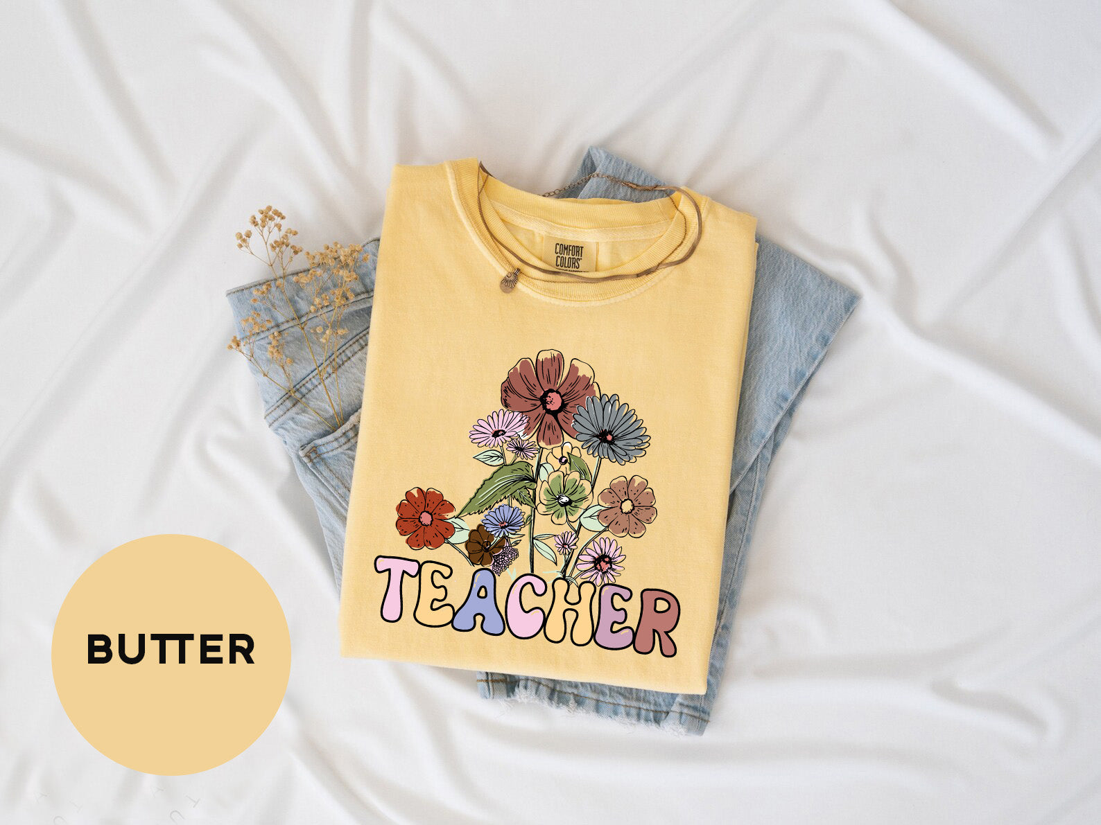 a t - shirt with a picture of a flower on it