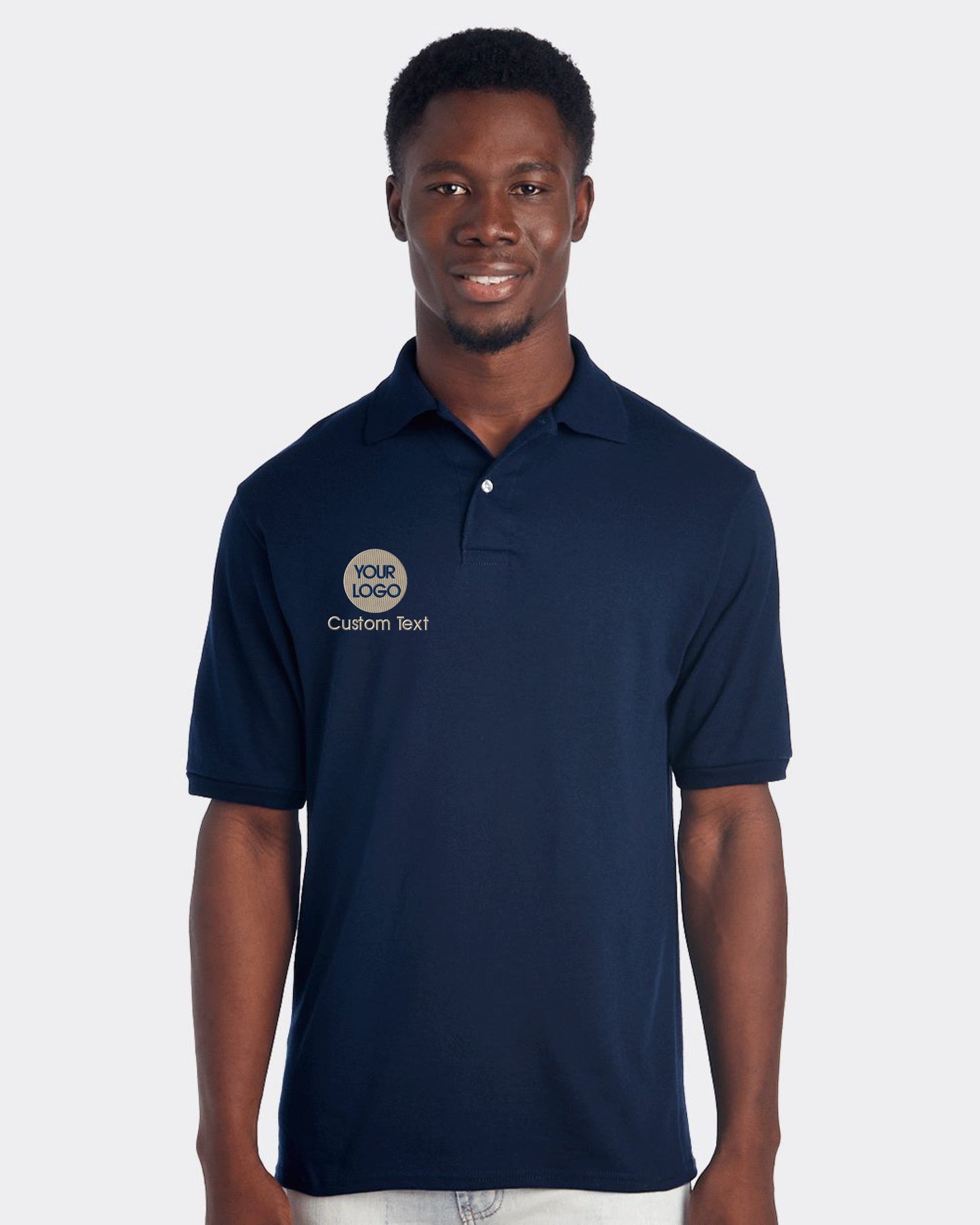 a man wearing a polo shirt with a logo on it