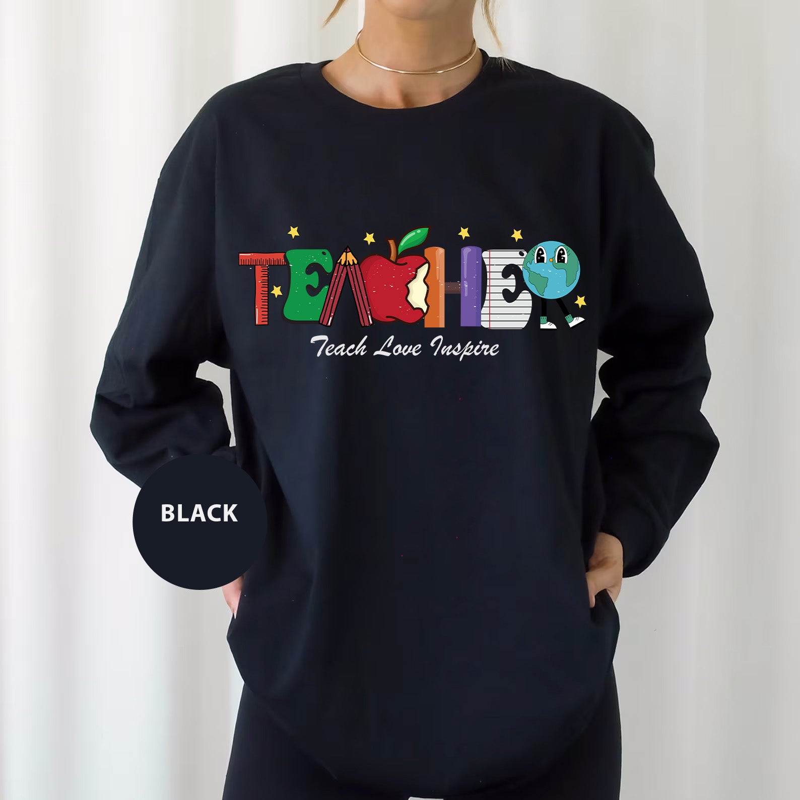 a woman wearing a black sweatshirt with the word tame printed on it
