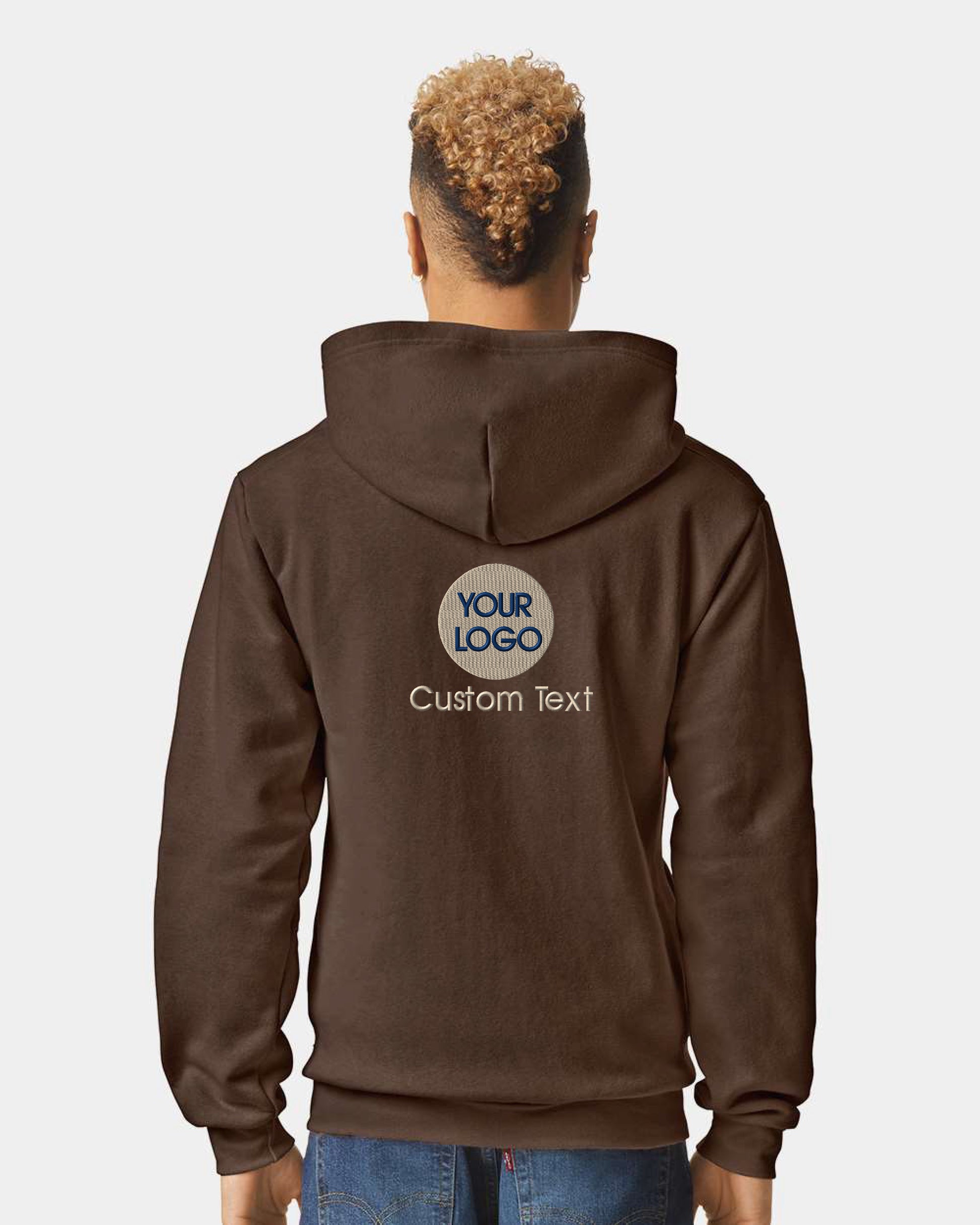 a man wearing a brown hoodie with a logo on it