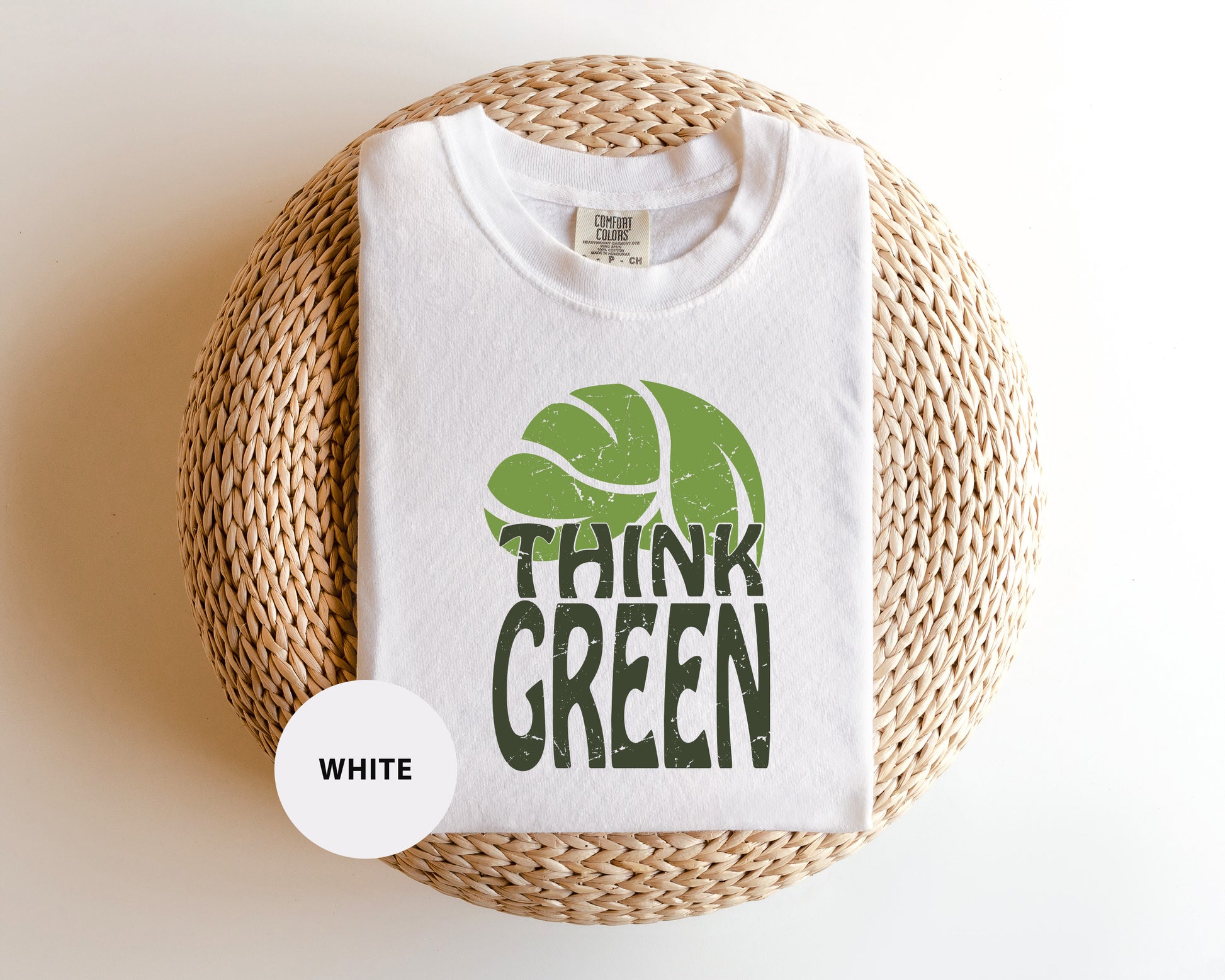a white t - shirt with the words think green printed on it