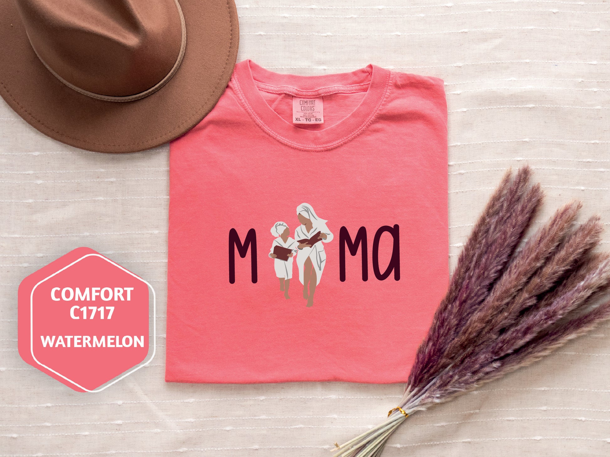 a pink shirt that says comfort c777 watermelon next to a