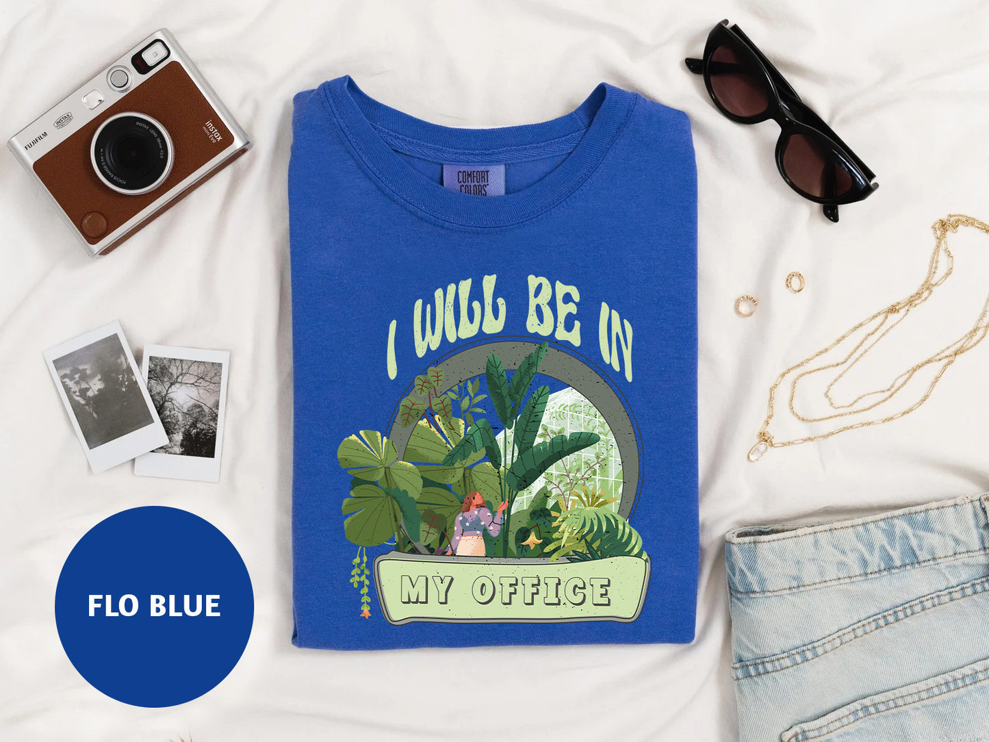 a t - shirt with a picture of a dinosaur on it