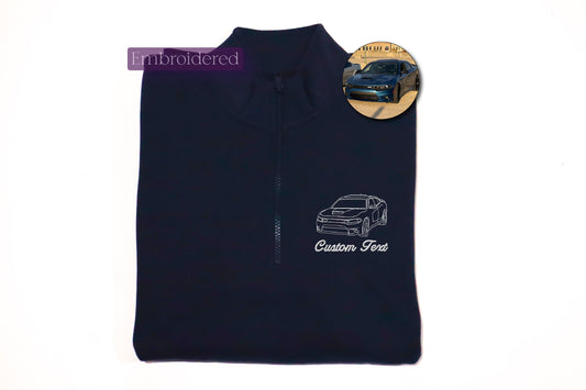 a black shirt with a picture of a car on it