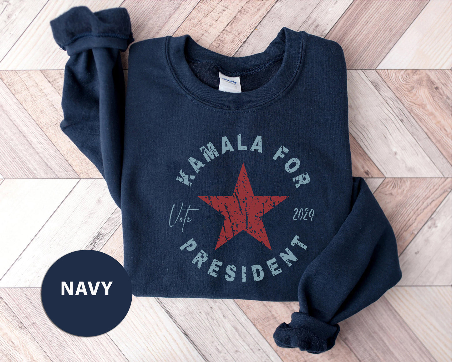 a navy sweatshirt with a red star on it