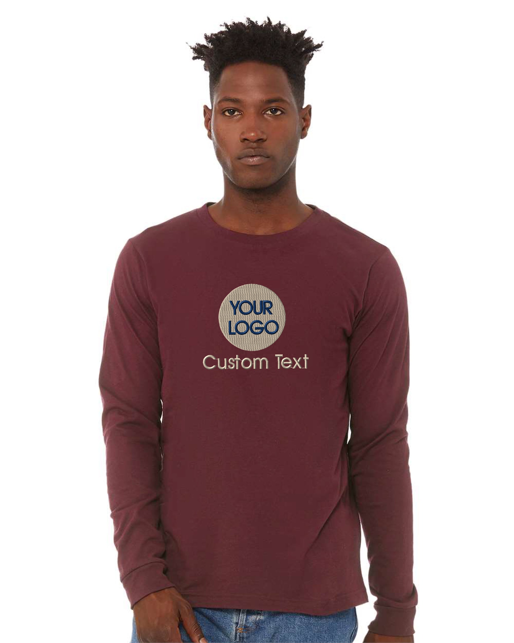 a man wearing a maroon long sleeve shirt