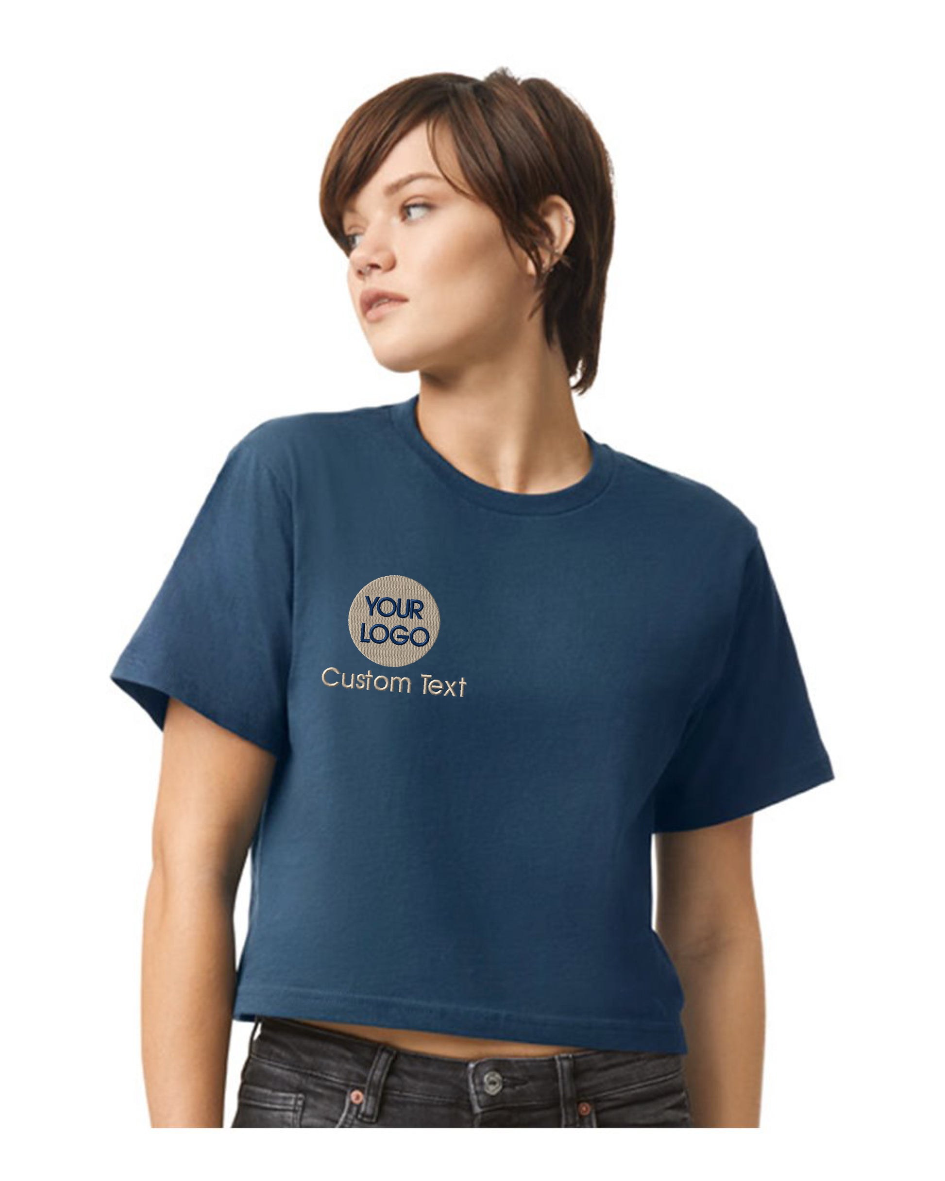 a woman wearing a blue t - shirt with the words, your cupcake is