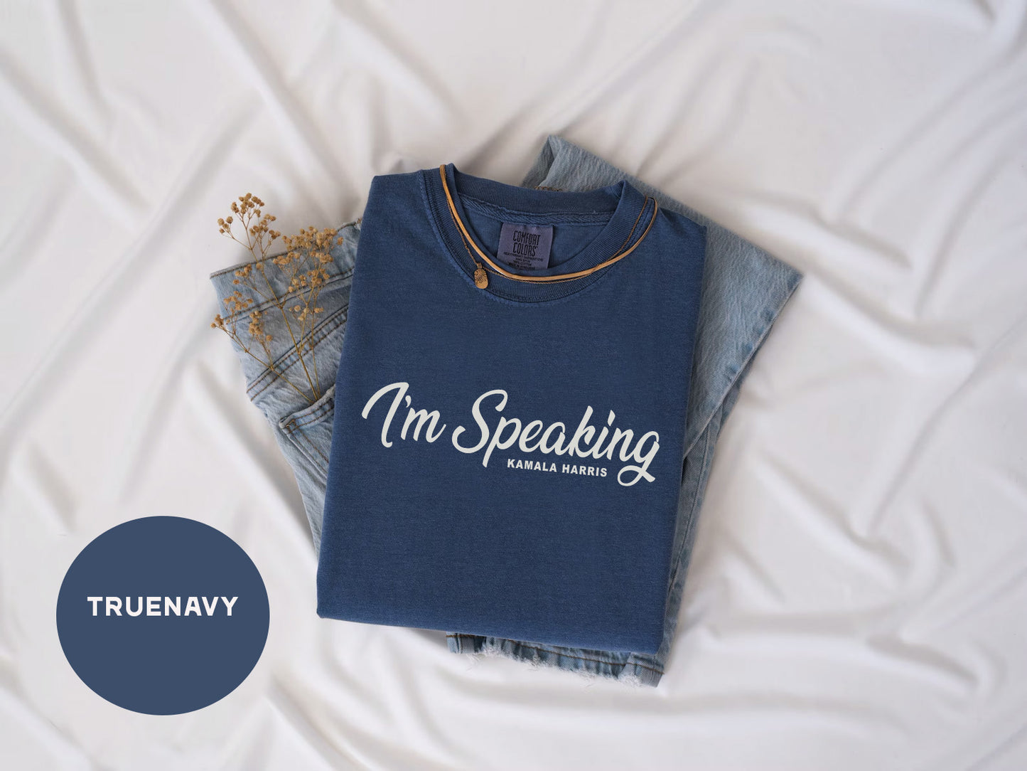 a t - shirt that says i'm speaking on it next to a pair