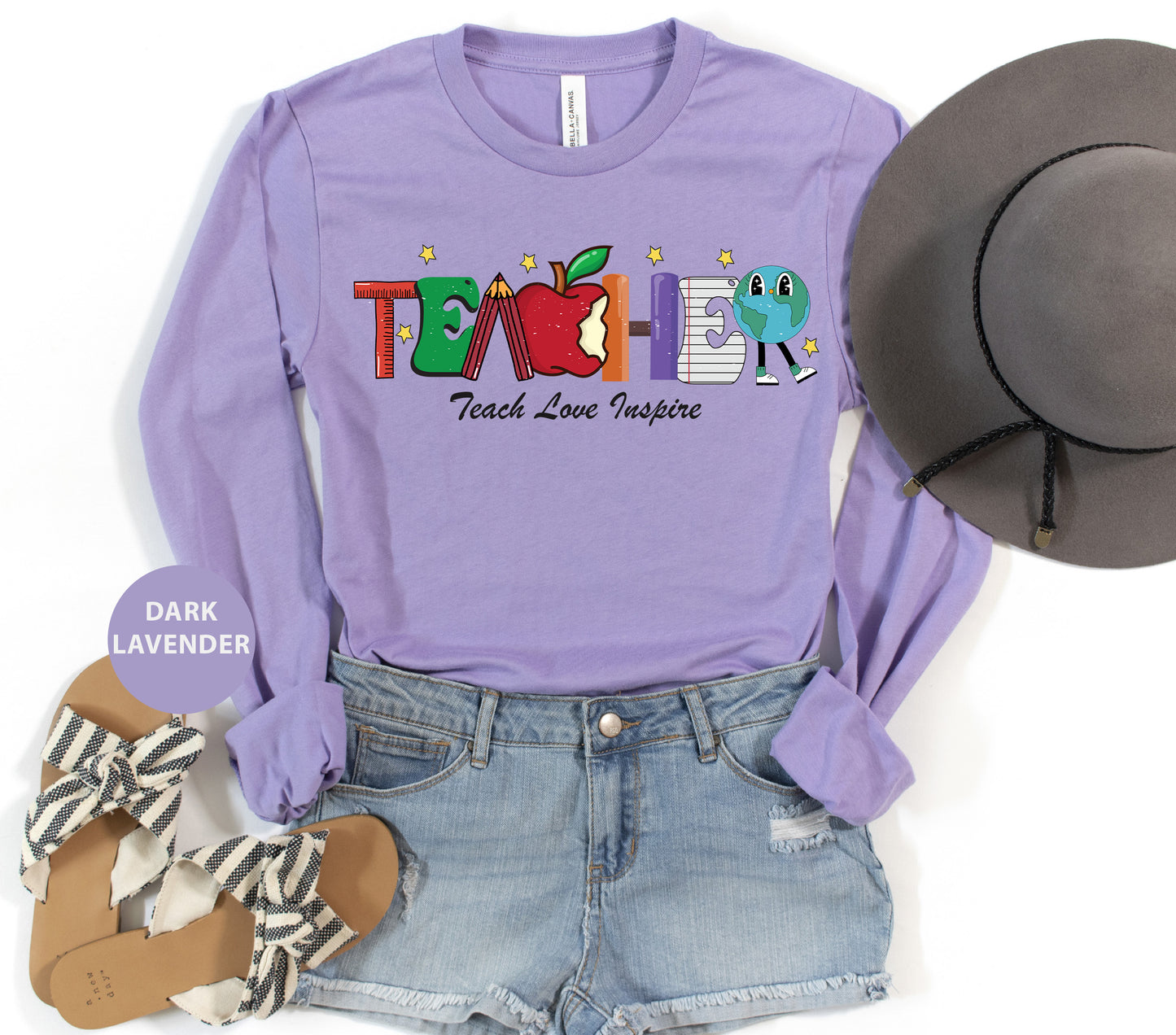 a purple shirt with the word teach on it