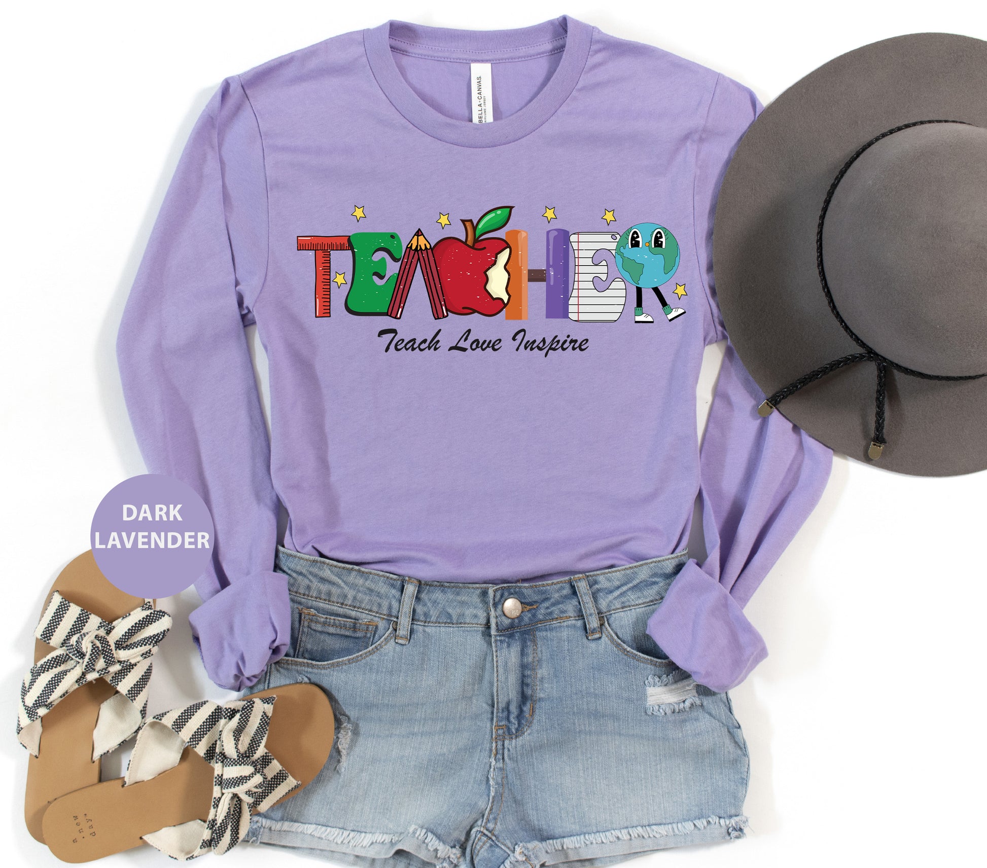 a purple shirt with the word teach on it