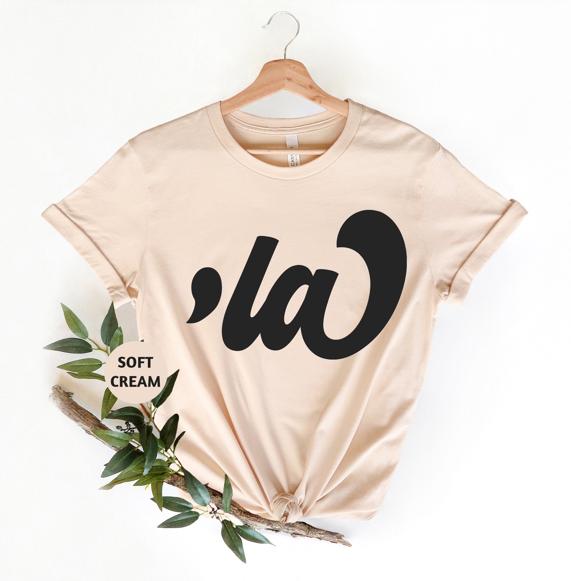 a t - shirt with the word cau printed on it