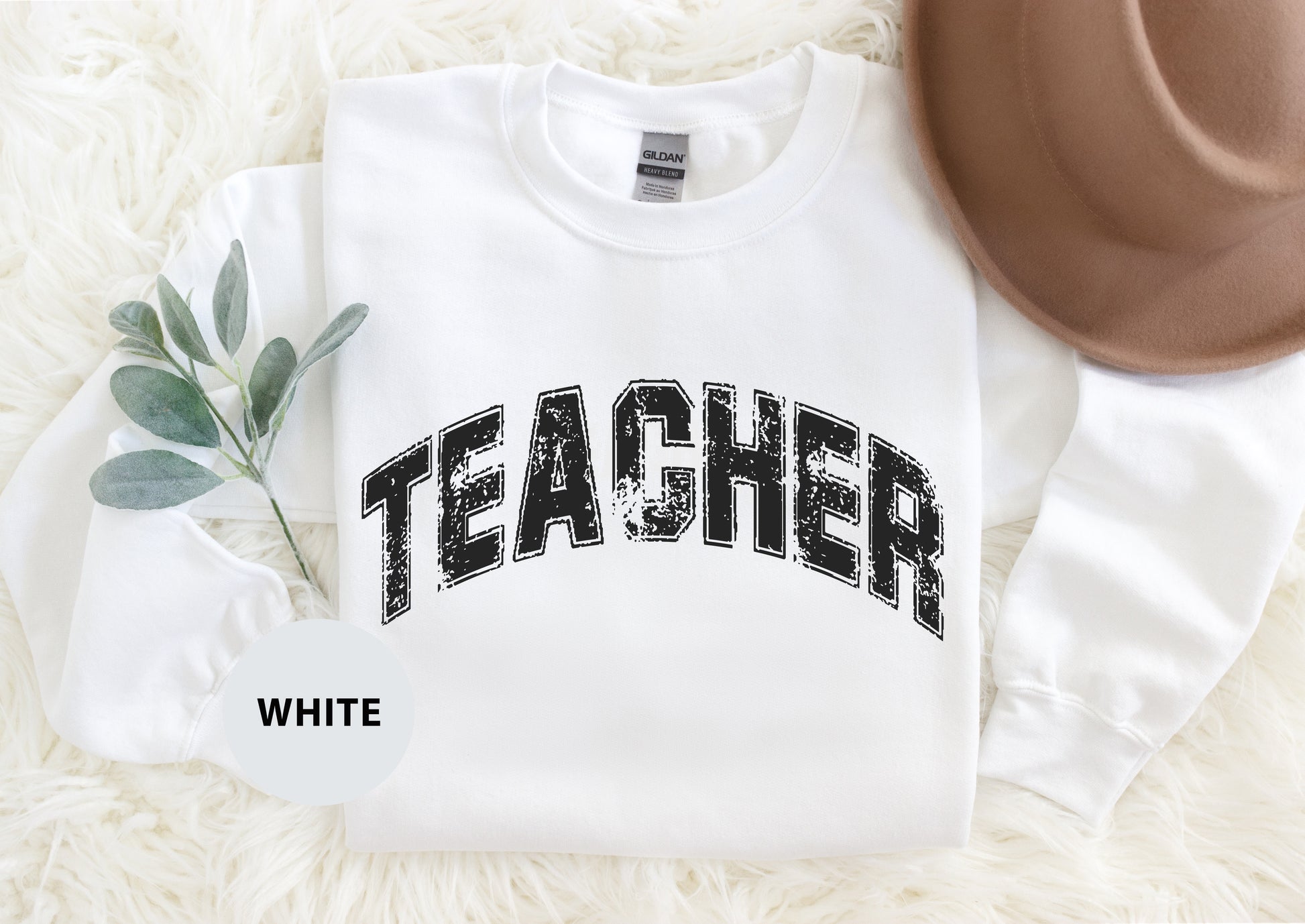 a white shirt with the word teacher printed on it