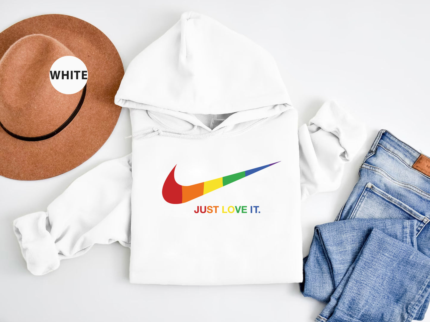 a white hoodie with a rainbow nike logo on it