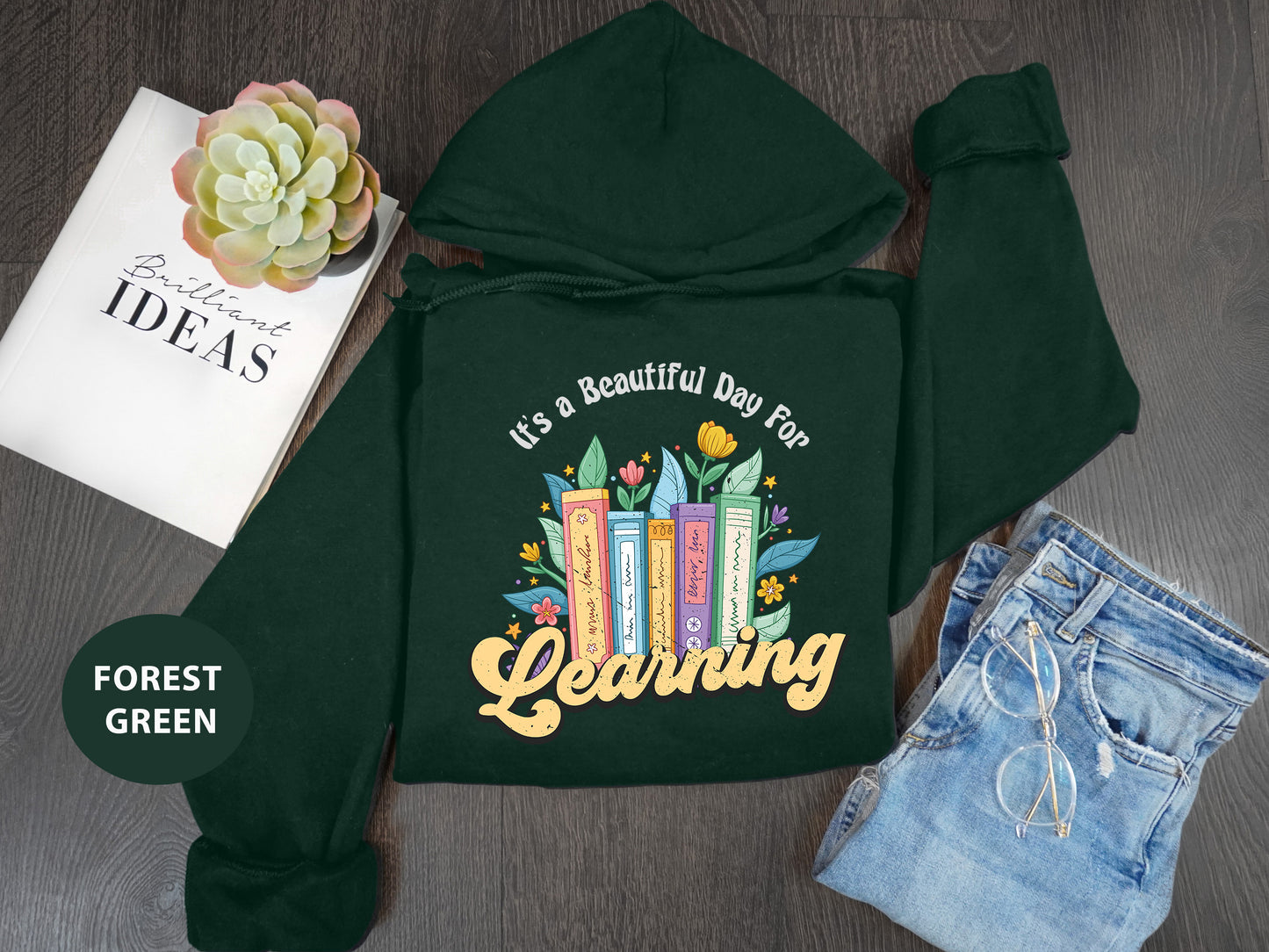 a green hoodie with the words, it's a beautiful day to be