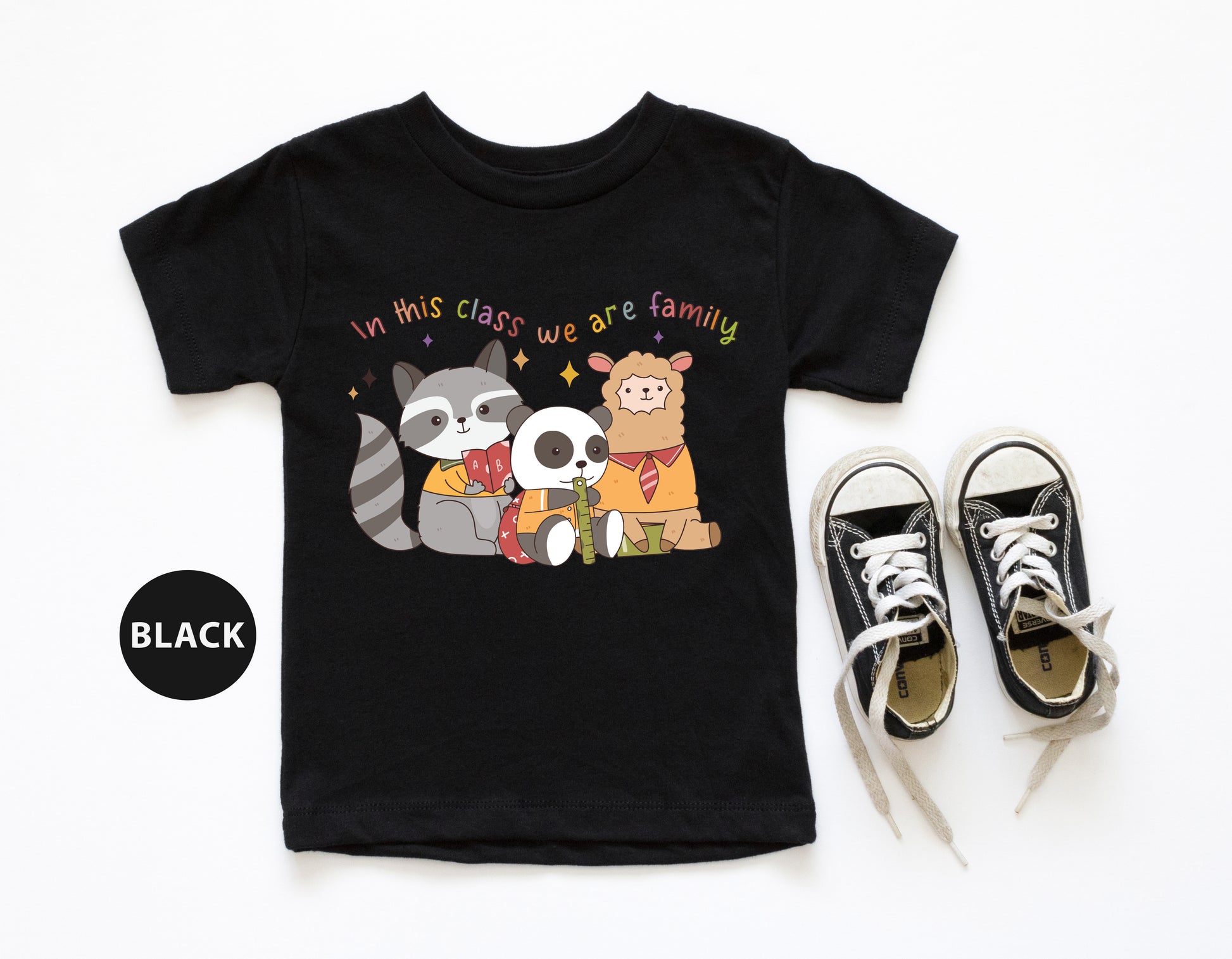 a pair of sneakers and a t - shirt with a raccoon and panda