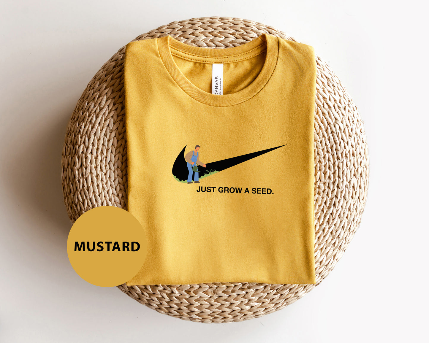 a yellow t - shirt with a picture of a bird on it