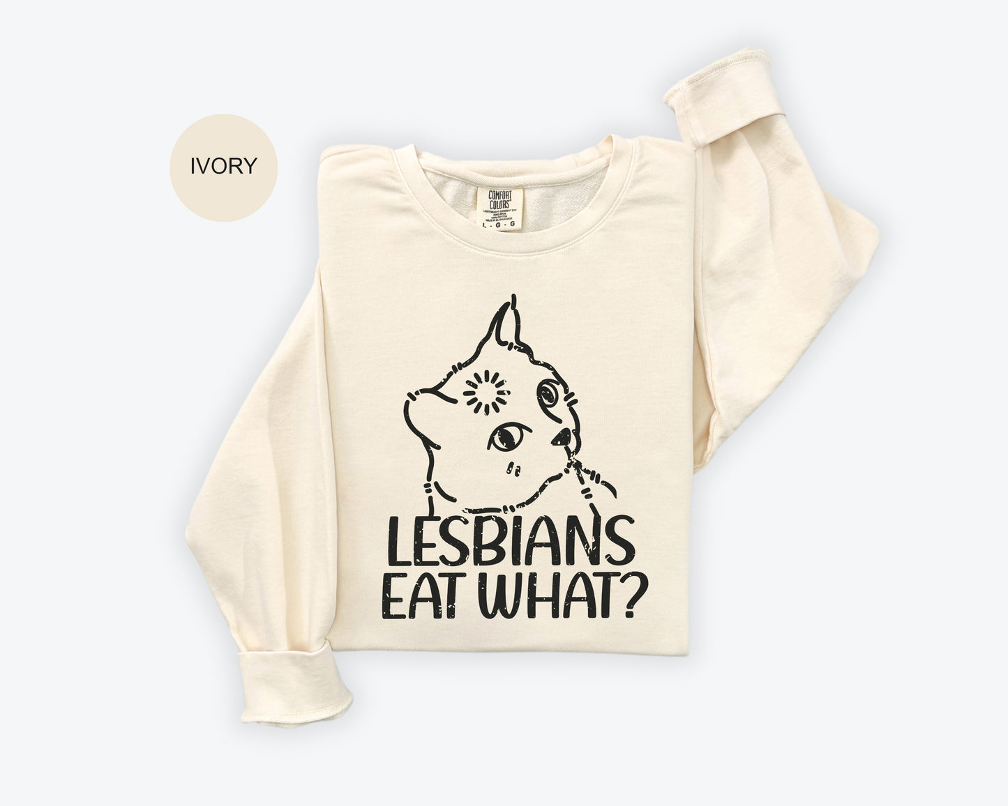 a white t - shirt with the words lesbians eat what? on it